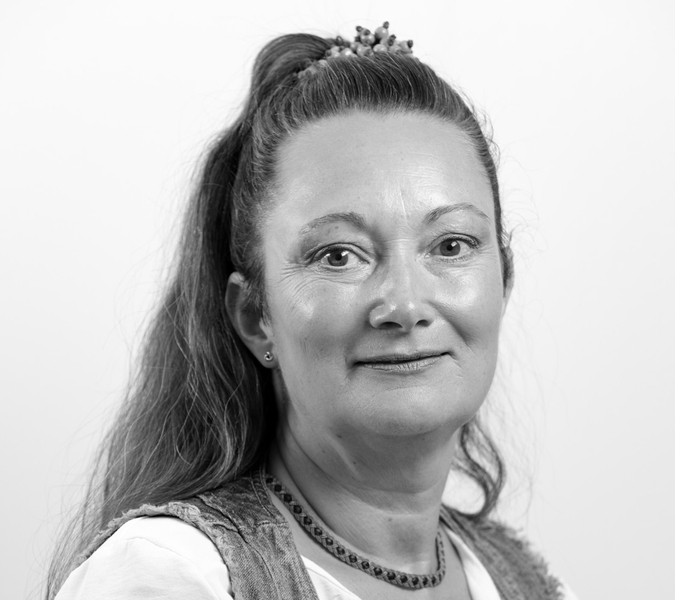 A black and white photo of a woman.