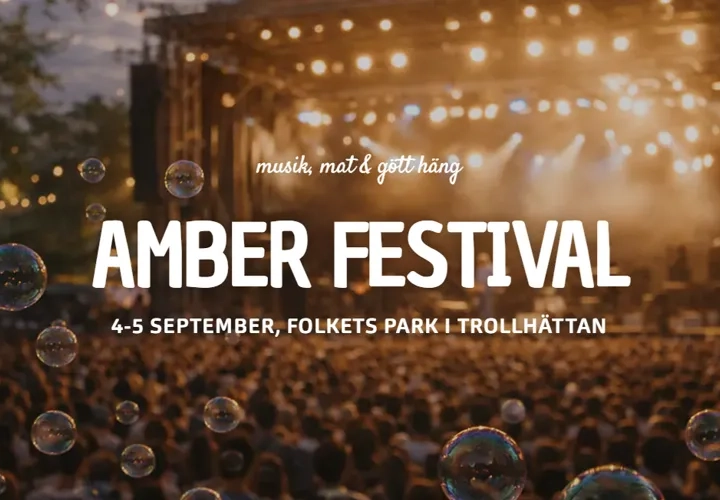En bild av en konsert med bubblor som svävar i luften.