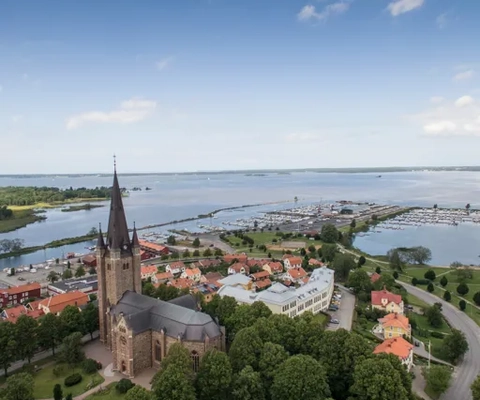 An aerial view of a city with a river running through it.
