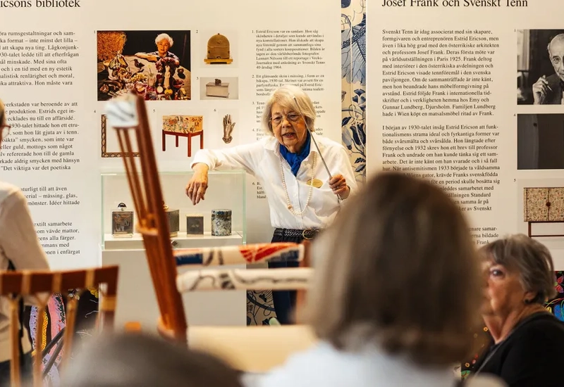 A group of people sitting around a table.