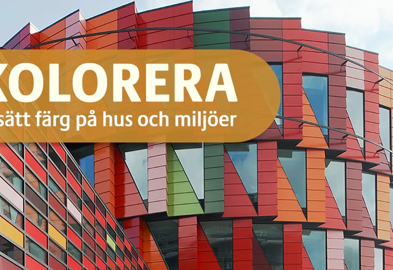 En färgglad byggnad med orden kolorera på.