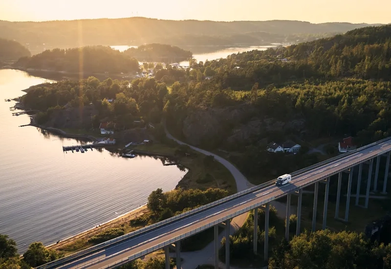 An aerial view of a bridge over a body of water.