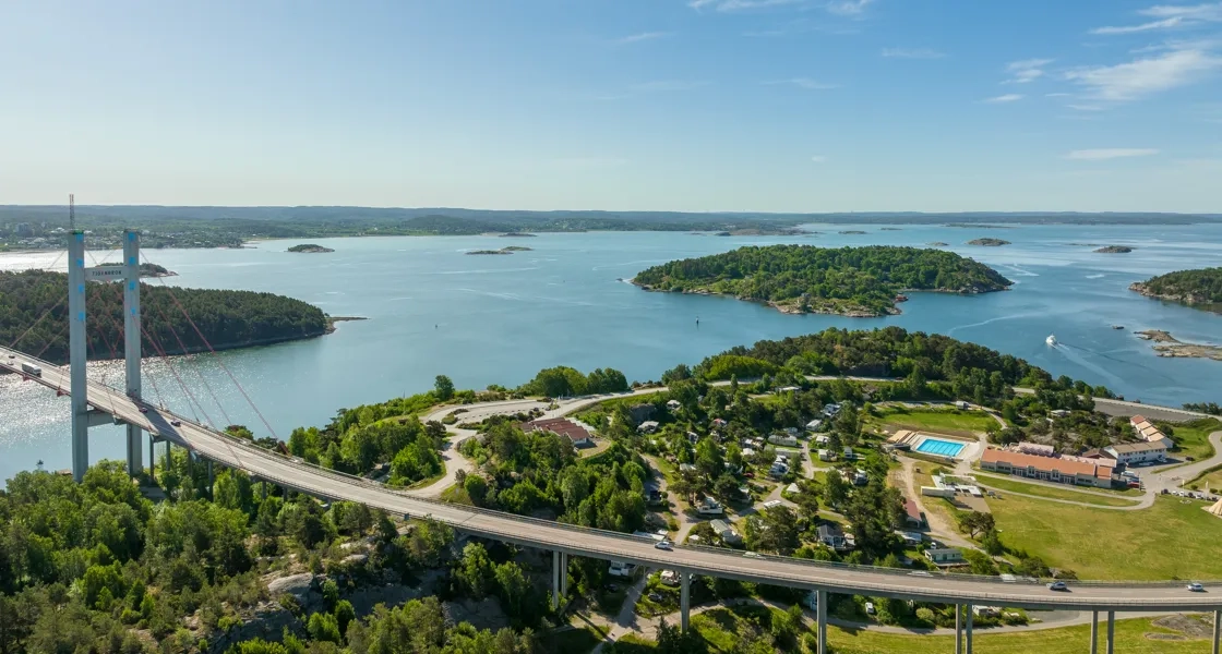 An aerial view of a bridge over a body of water.