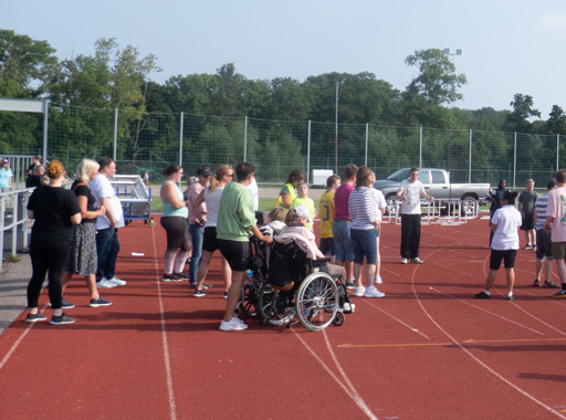 Människor på löparbana - funktionshinder
