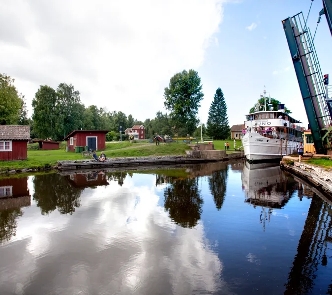 A boat is docked at a small dock.