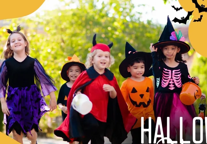 En grupp barn klädda i halloweenkostymer.