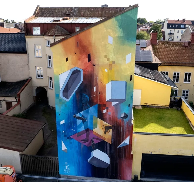 Målning på husfasad i Vänersborg