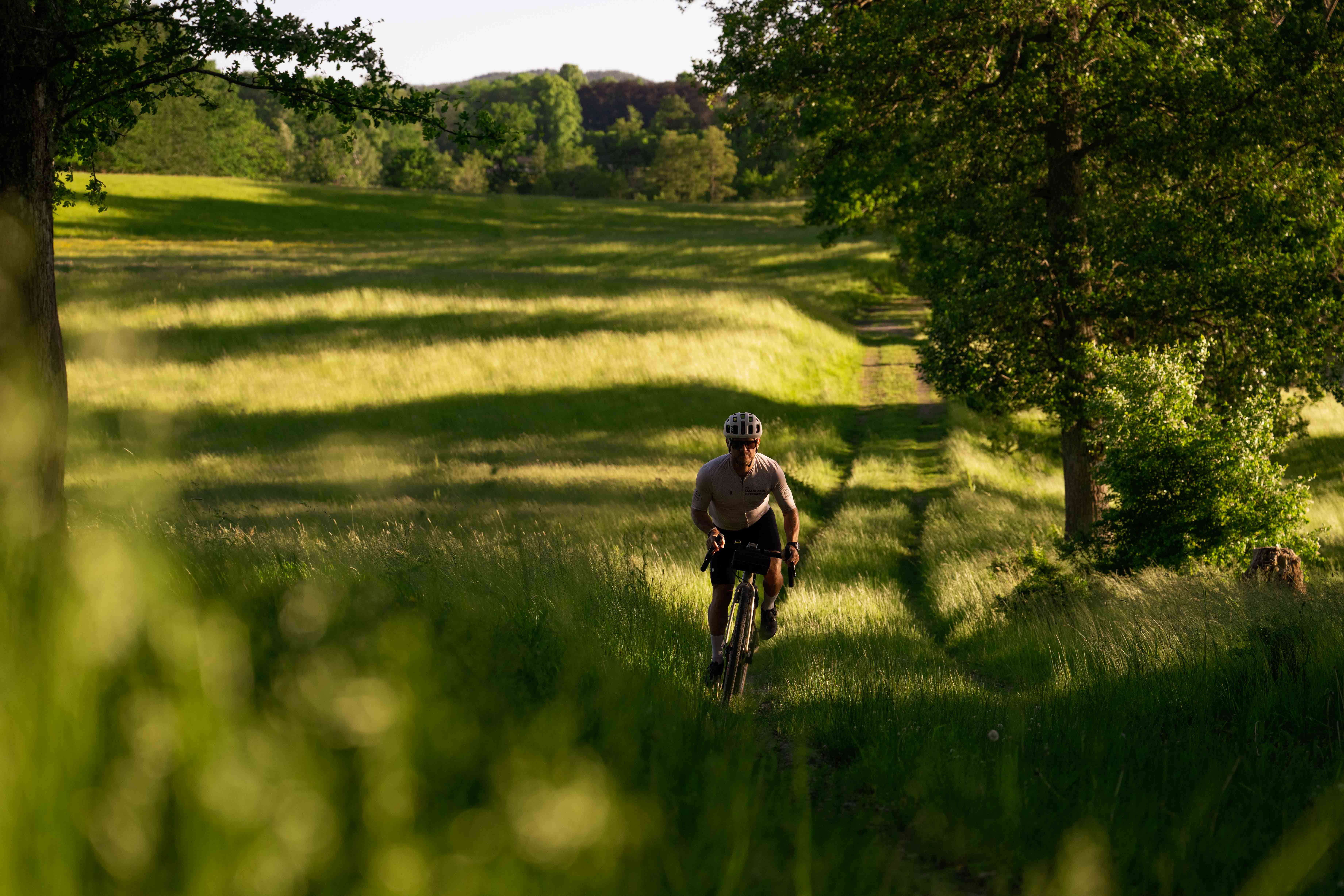 Cycling on gravel roads in a rural environment.
