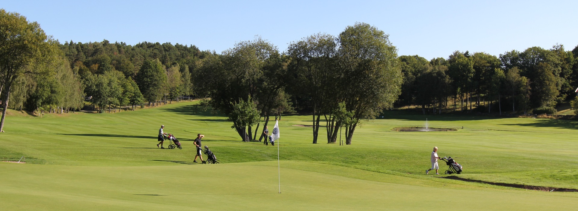 Golf players at Gullbringa Golf & Country Club.