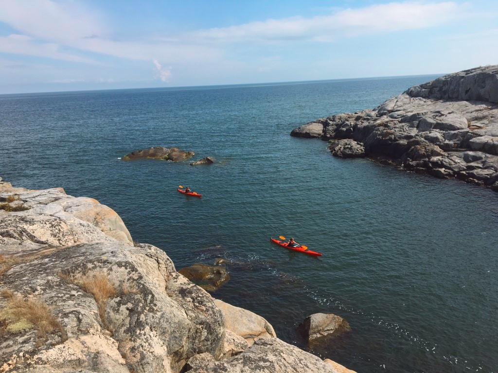 Birdseye view over kayakers in West Sweden´s archipelago