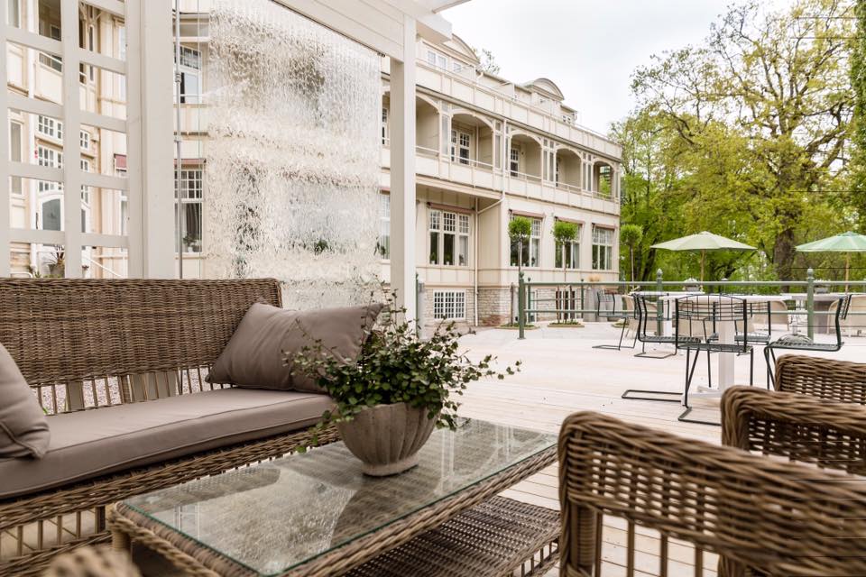 Outdoor terrace with seating groups.