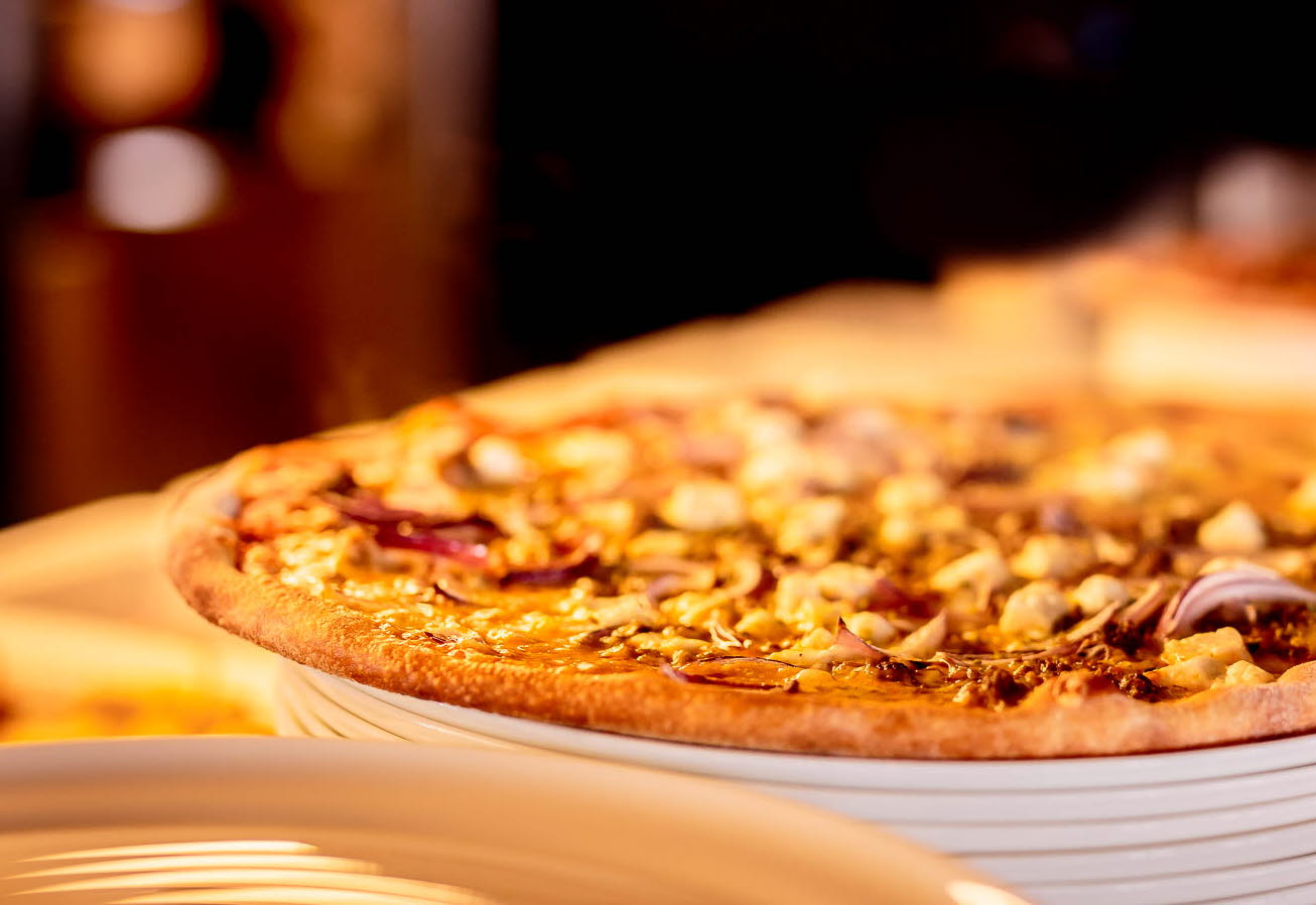 A delicious pizza at Pizza på Restaurang Bella Gästis