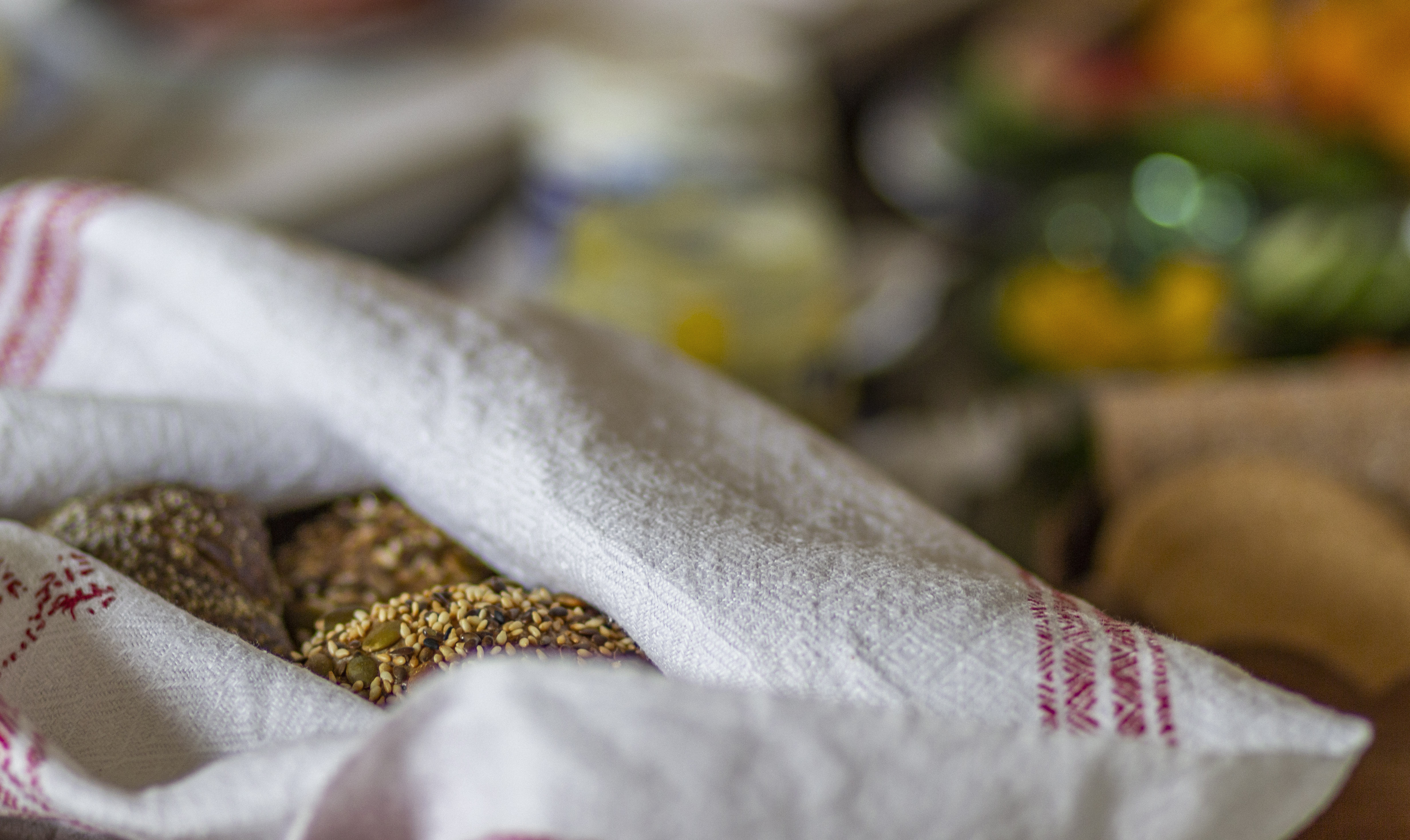 Bread in a kitchen towel.