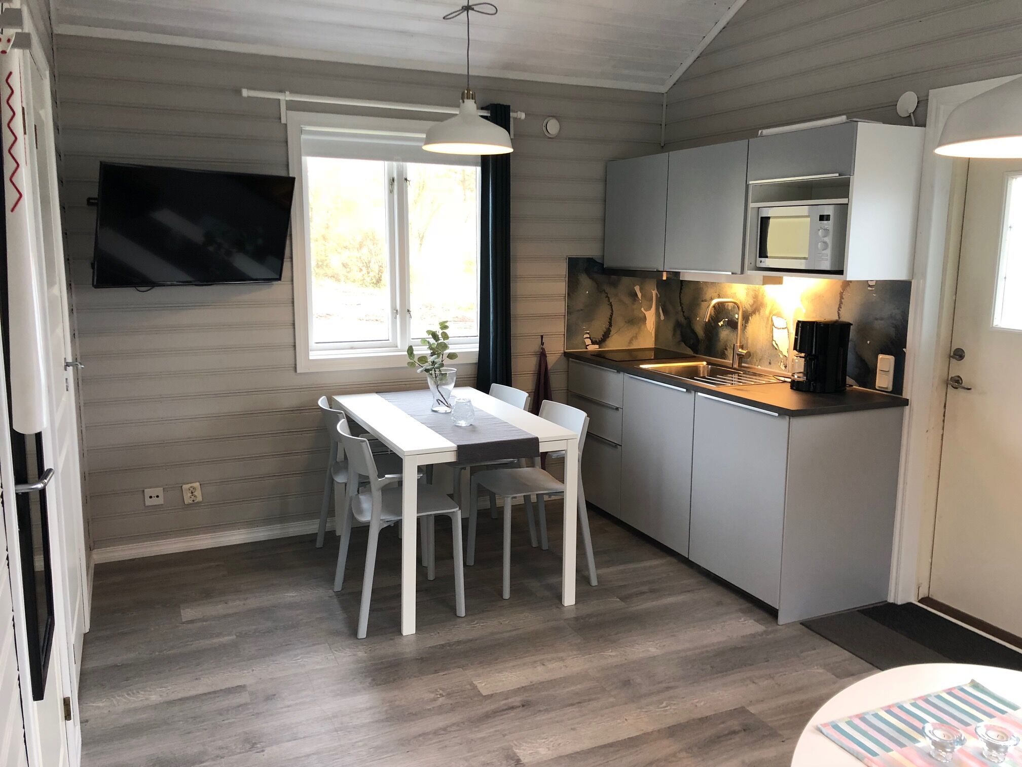 Kitchen with a table in a camping cabin.