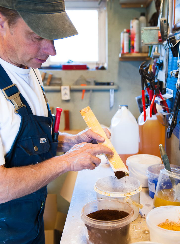 Staff is making paint in the workshop