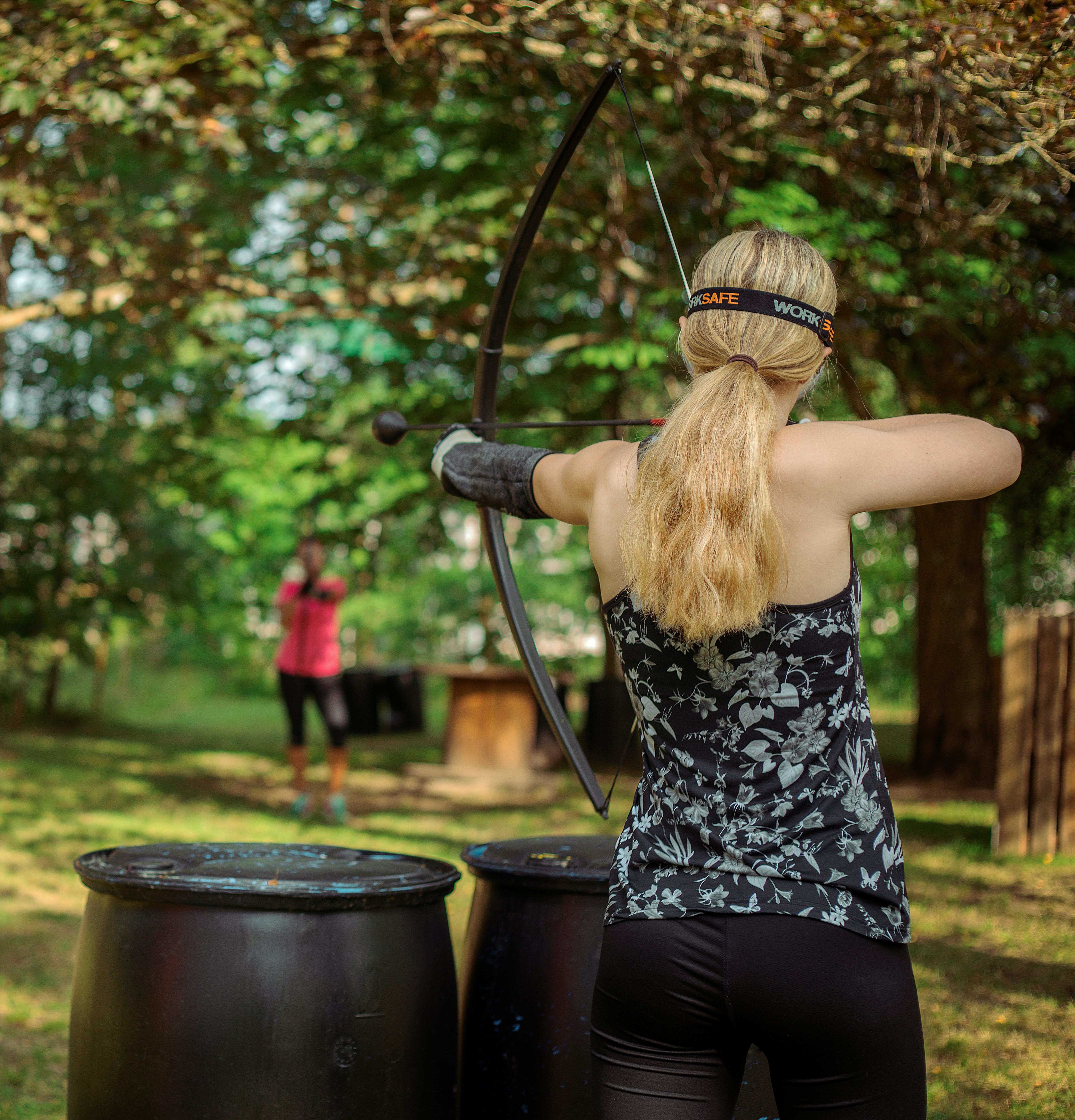 Guest shooting bow at Upzone.