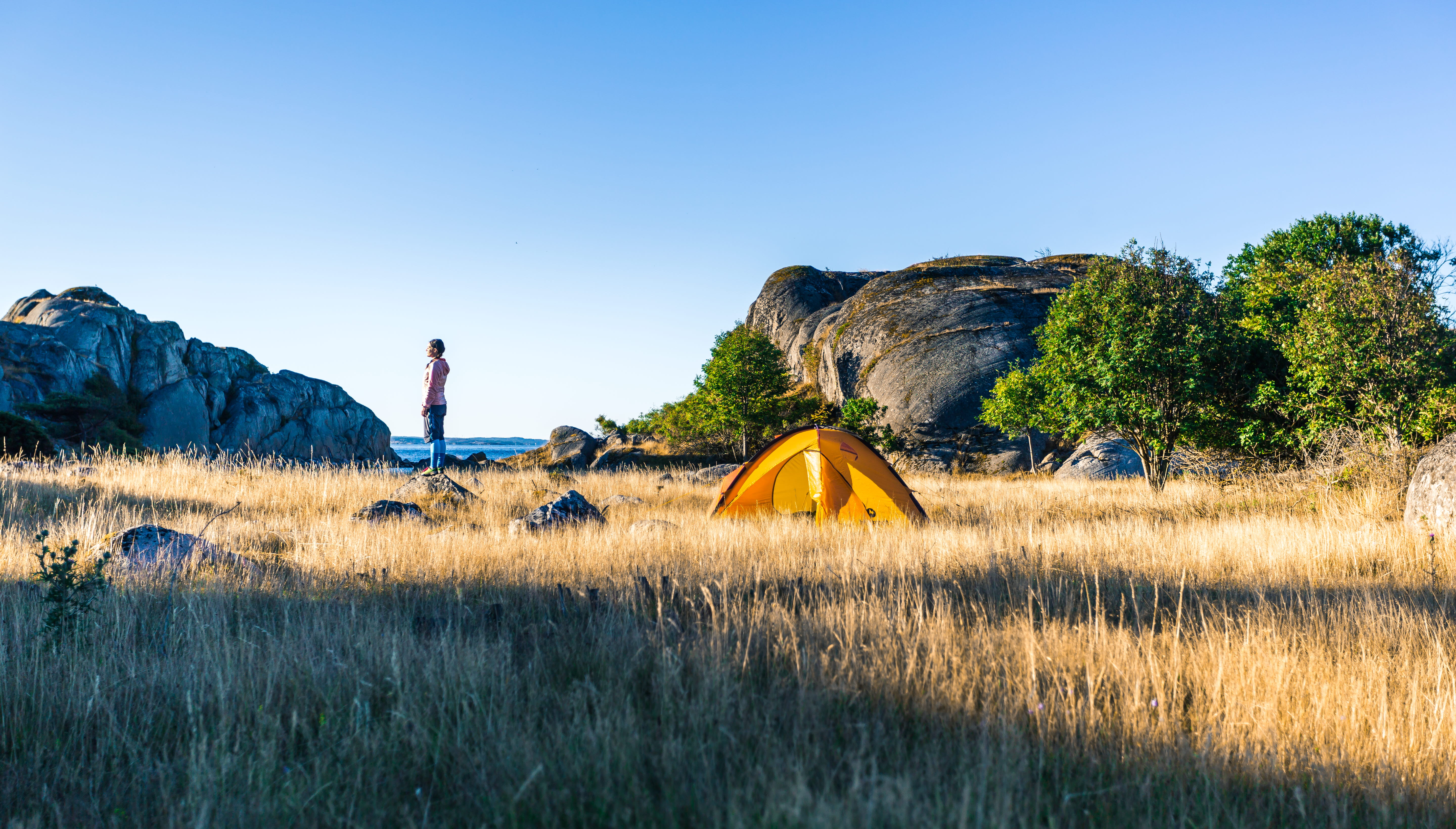 Woman beside a tent in Bohuslän
