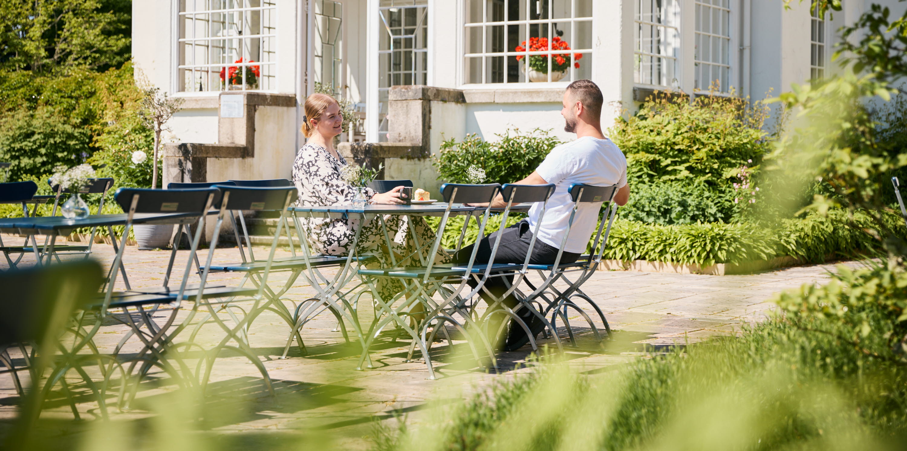 People hanging out in a mansion.