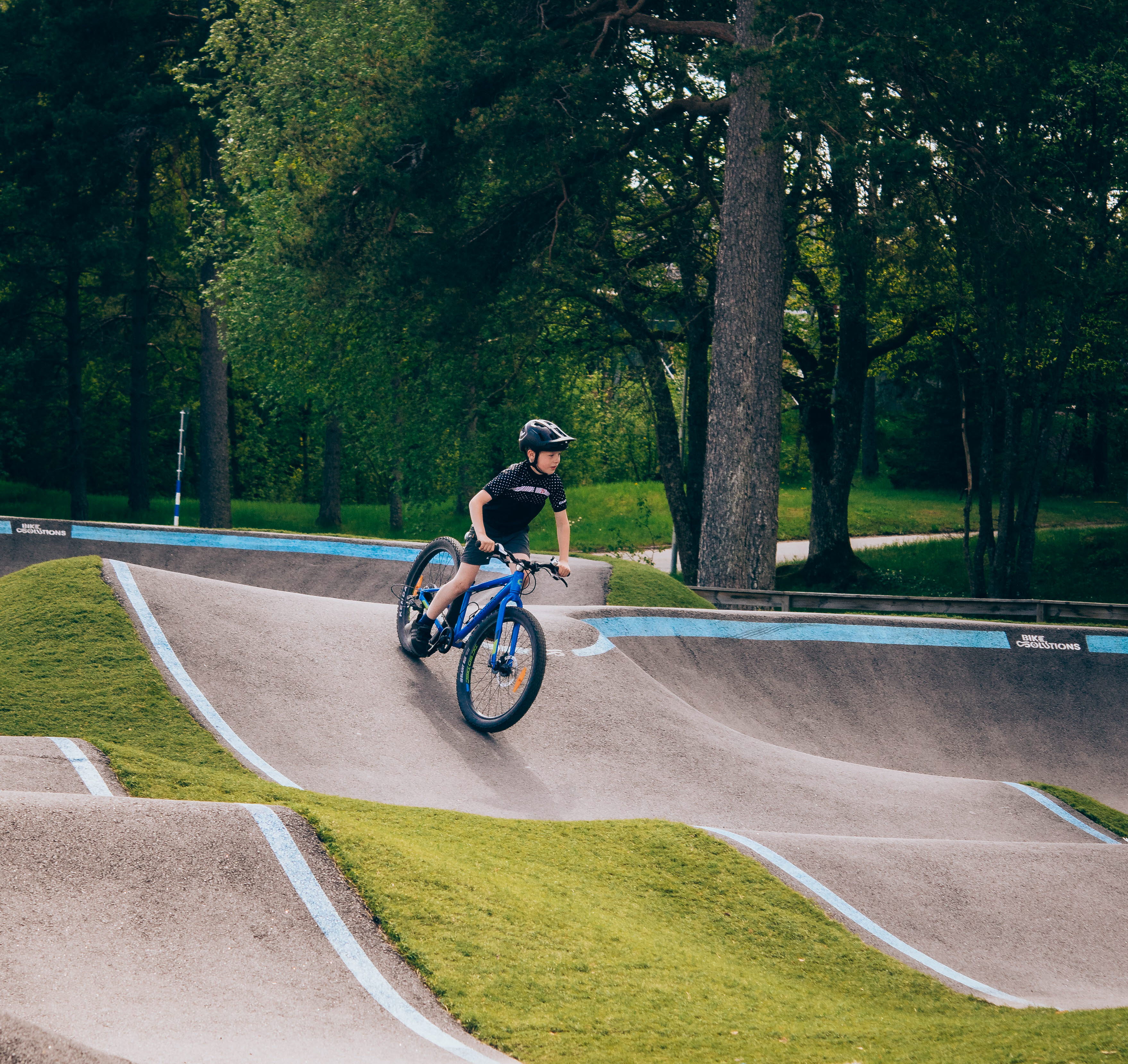 Active children cycle on a bikepark