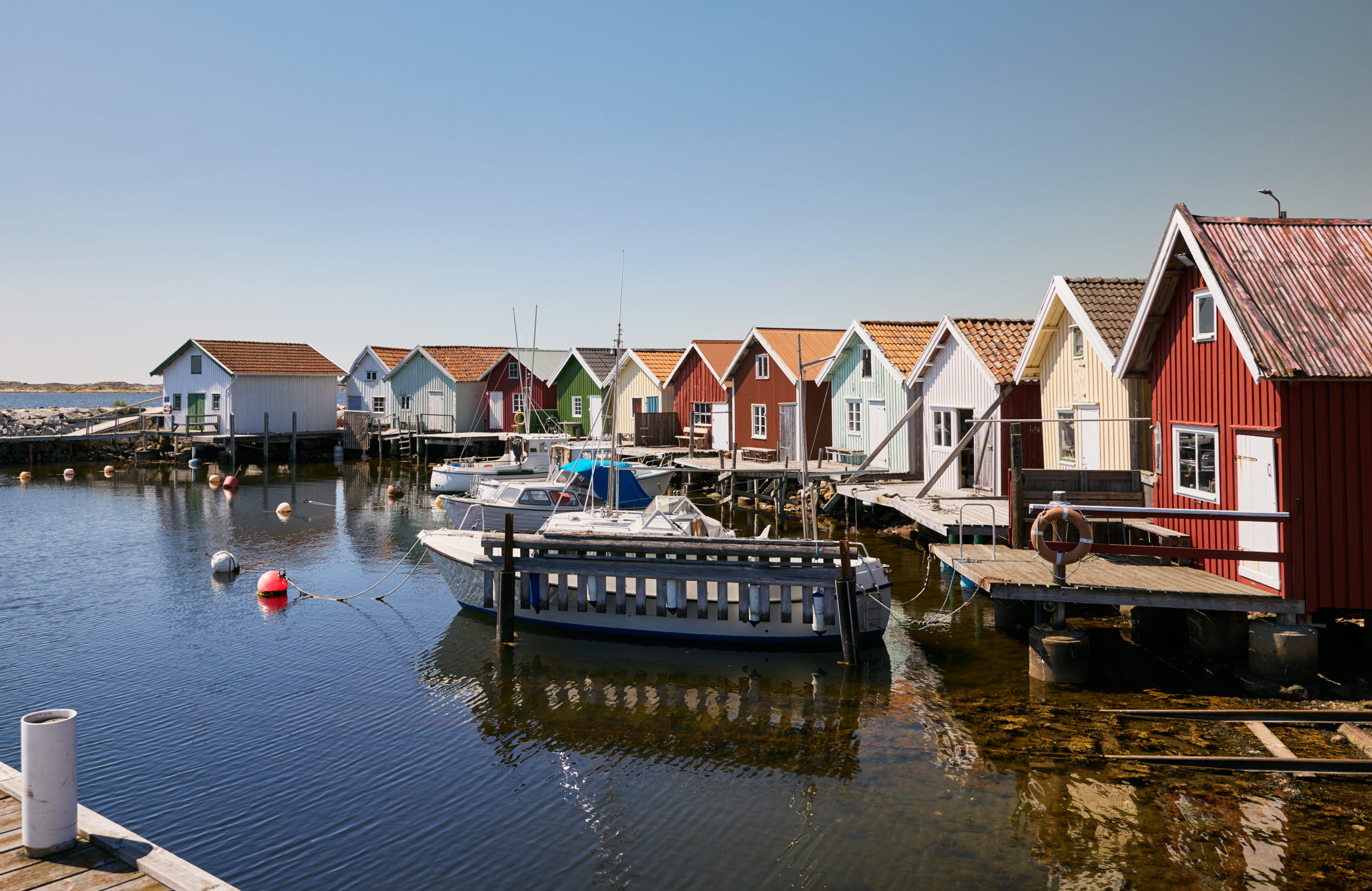 Two people are cycling on an island.
