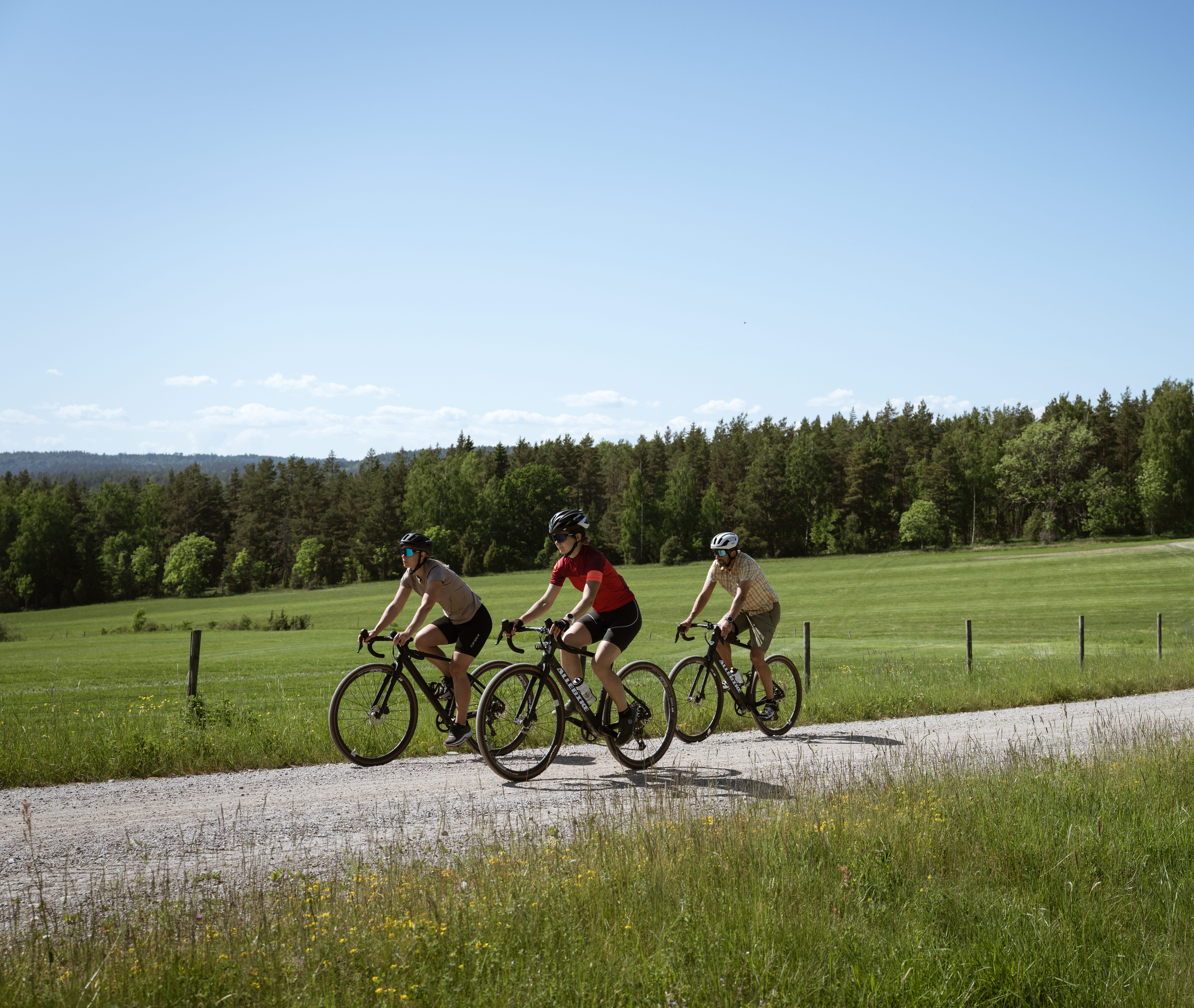Cyclists on a dirt road,