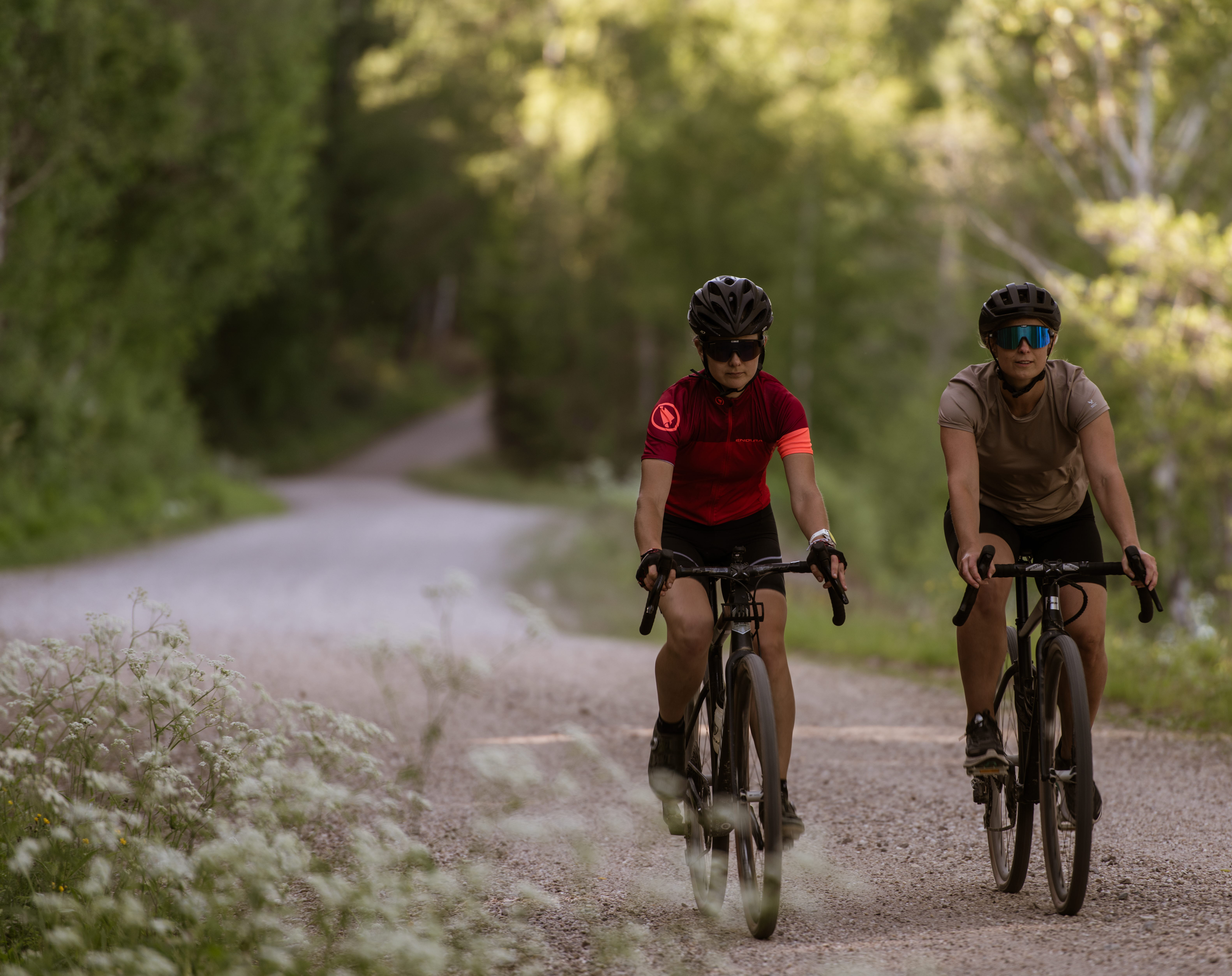 Cyclists on a dirt road,