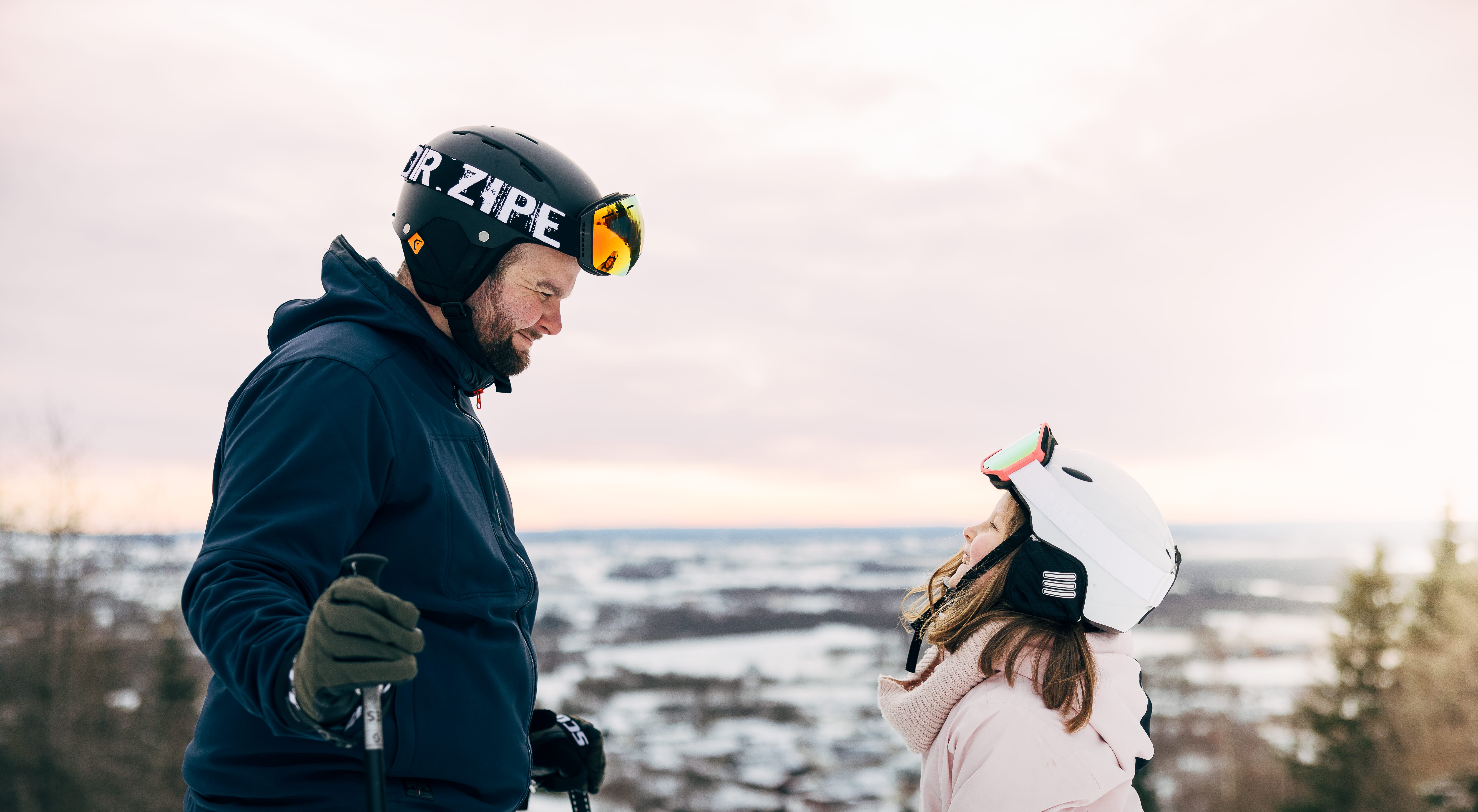 Family in wintry landscape.