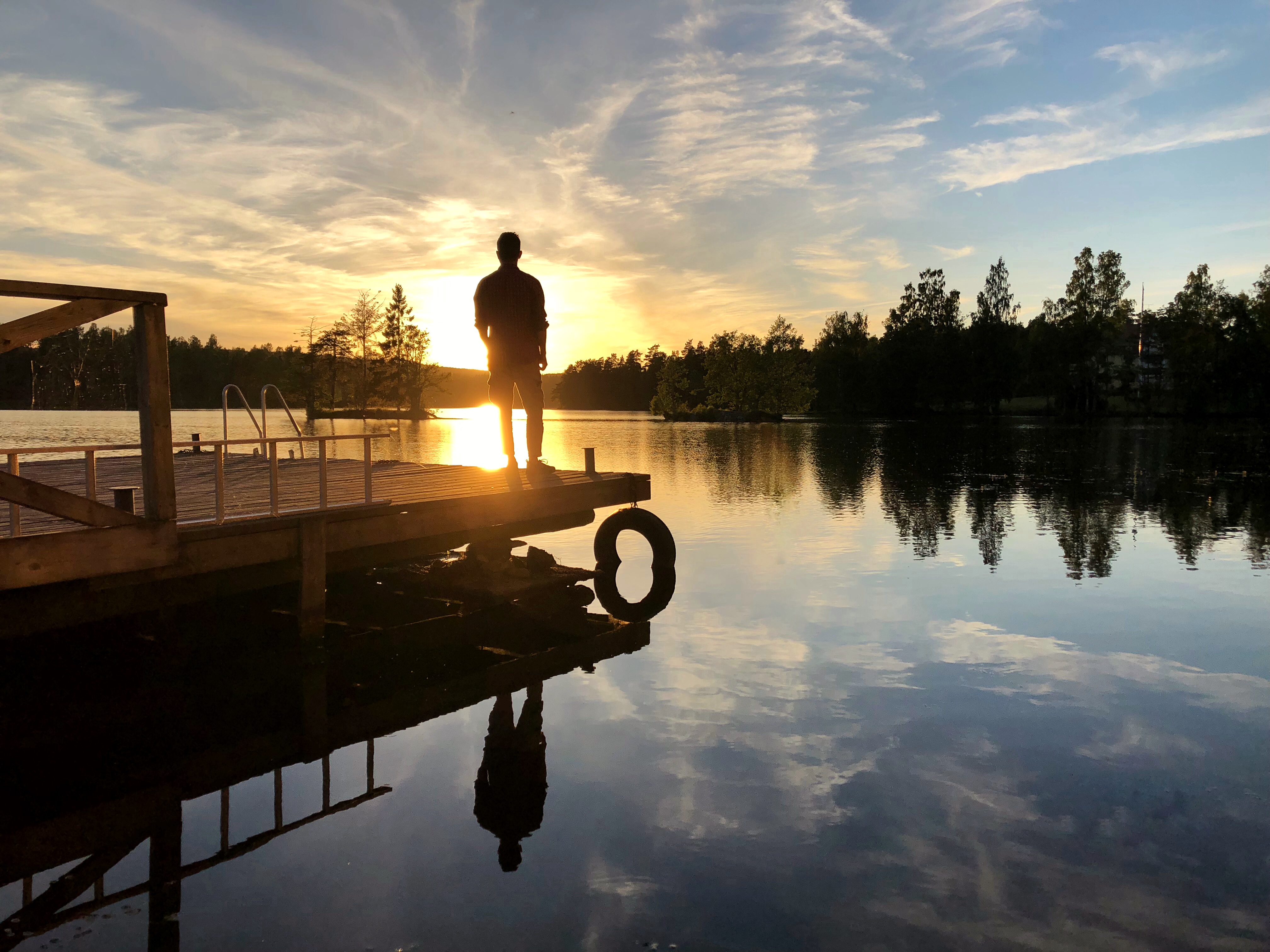 Alex Vizeo, french youtubeer looking over a lake