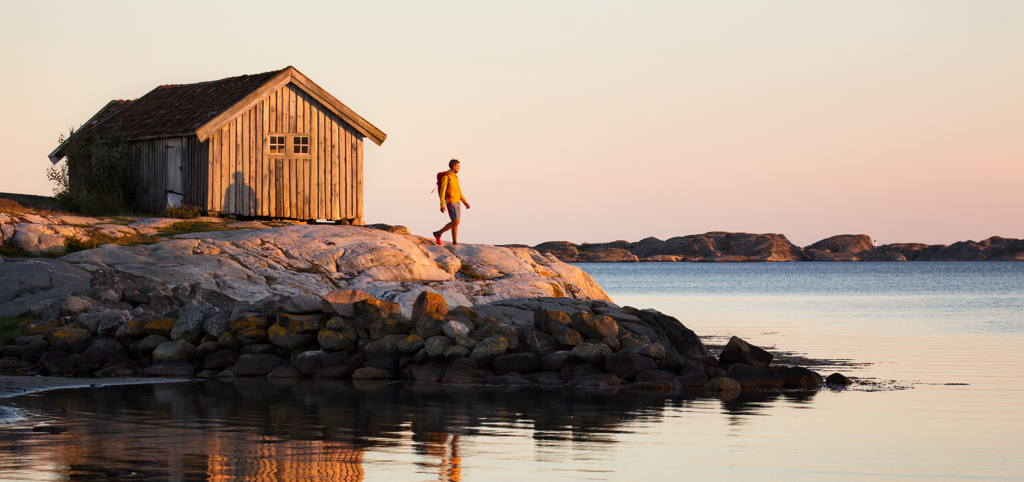 Walking by the ocean at sunset