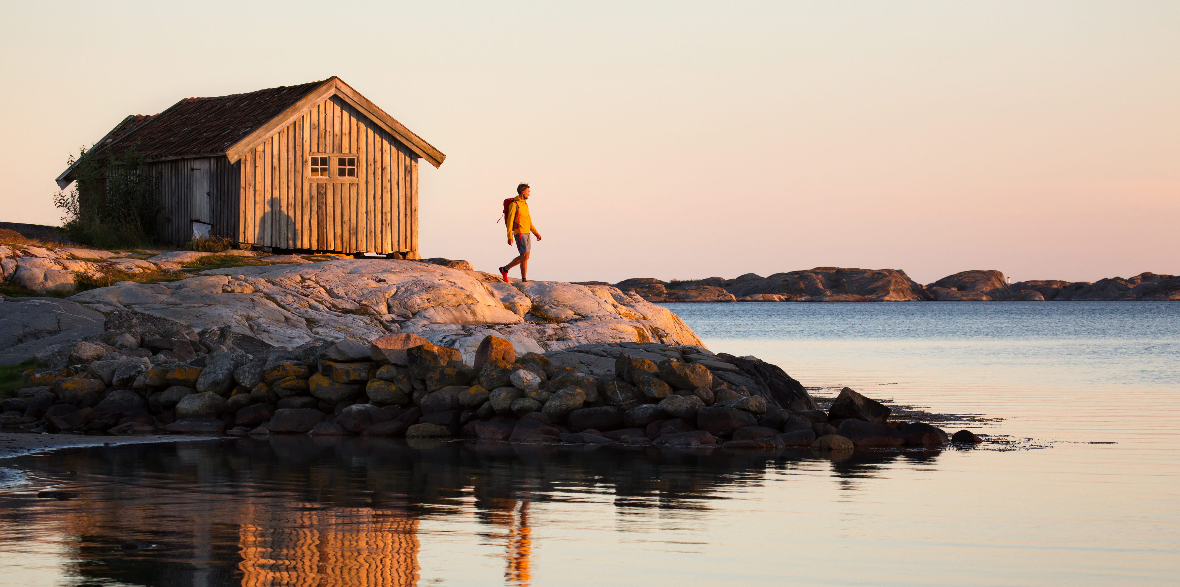 Walking by the ocean at sunset