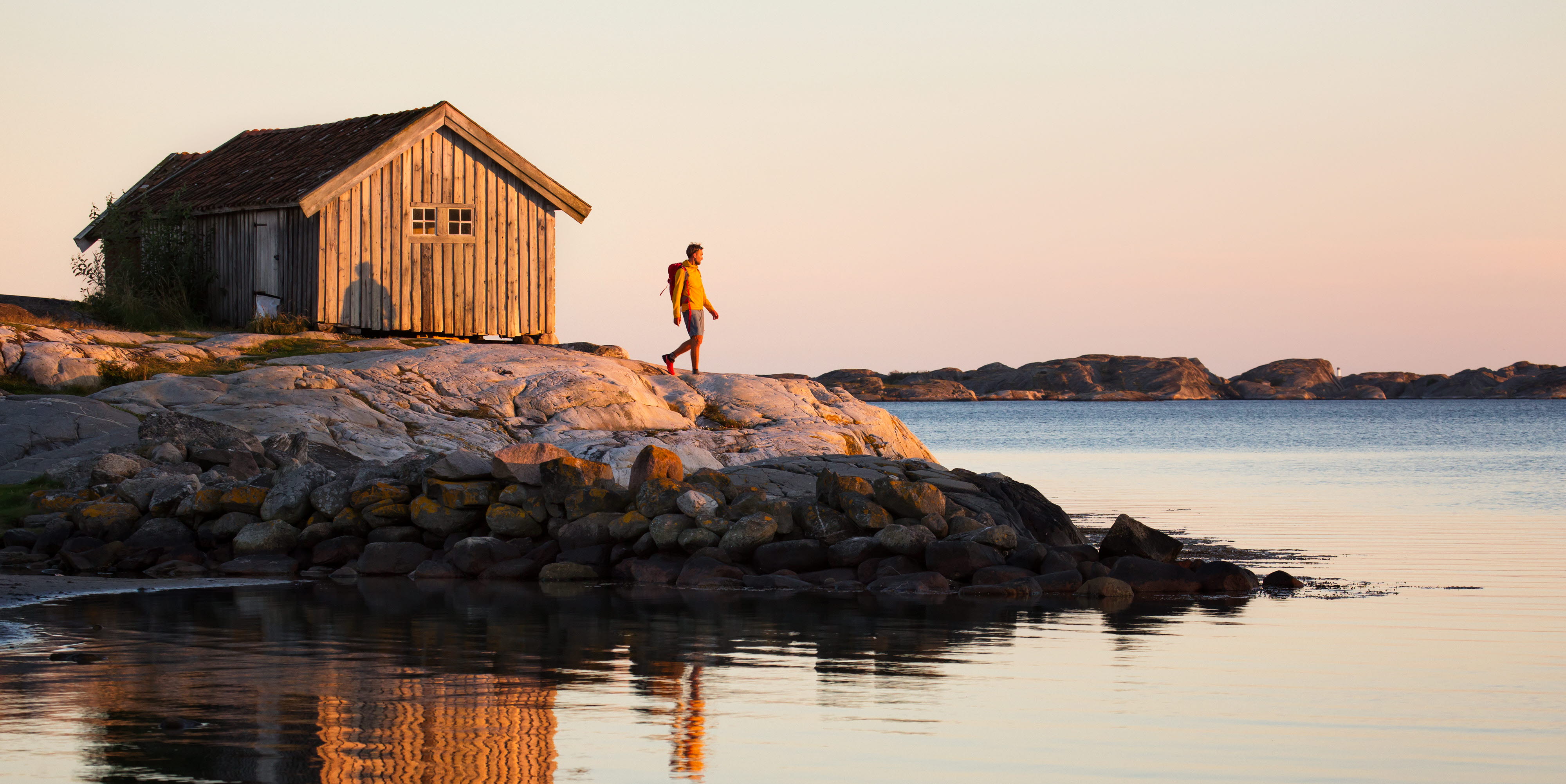 Walking by the ocean at sunset