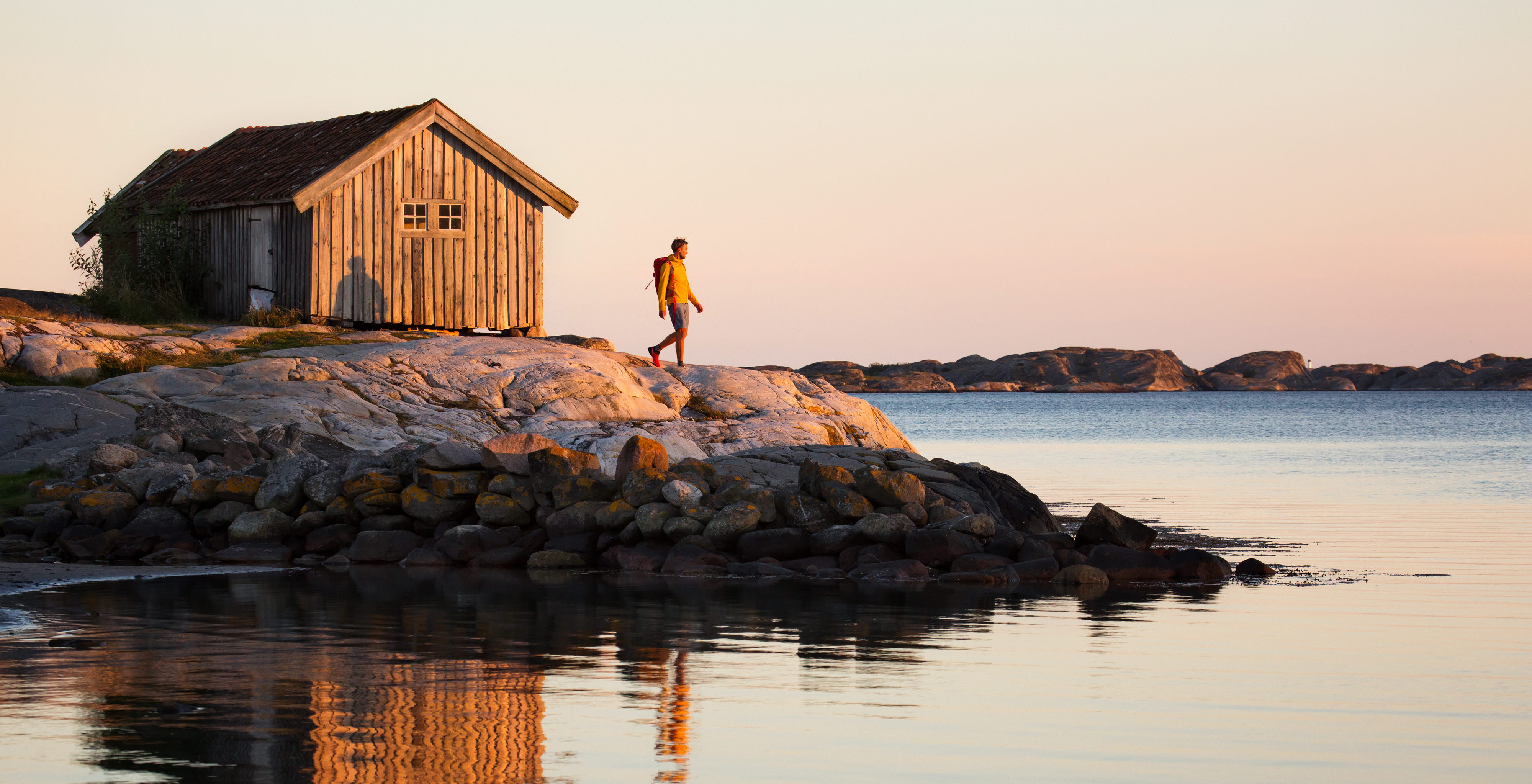 Walking by the ocean at sunset