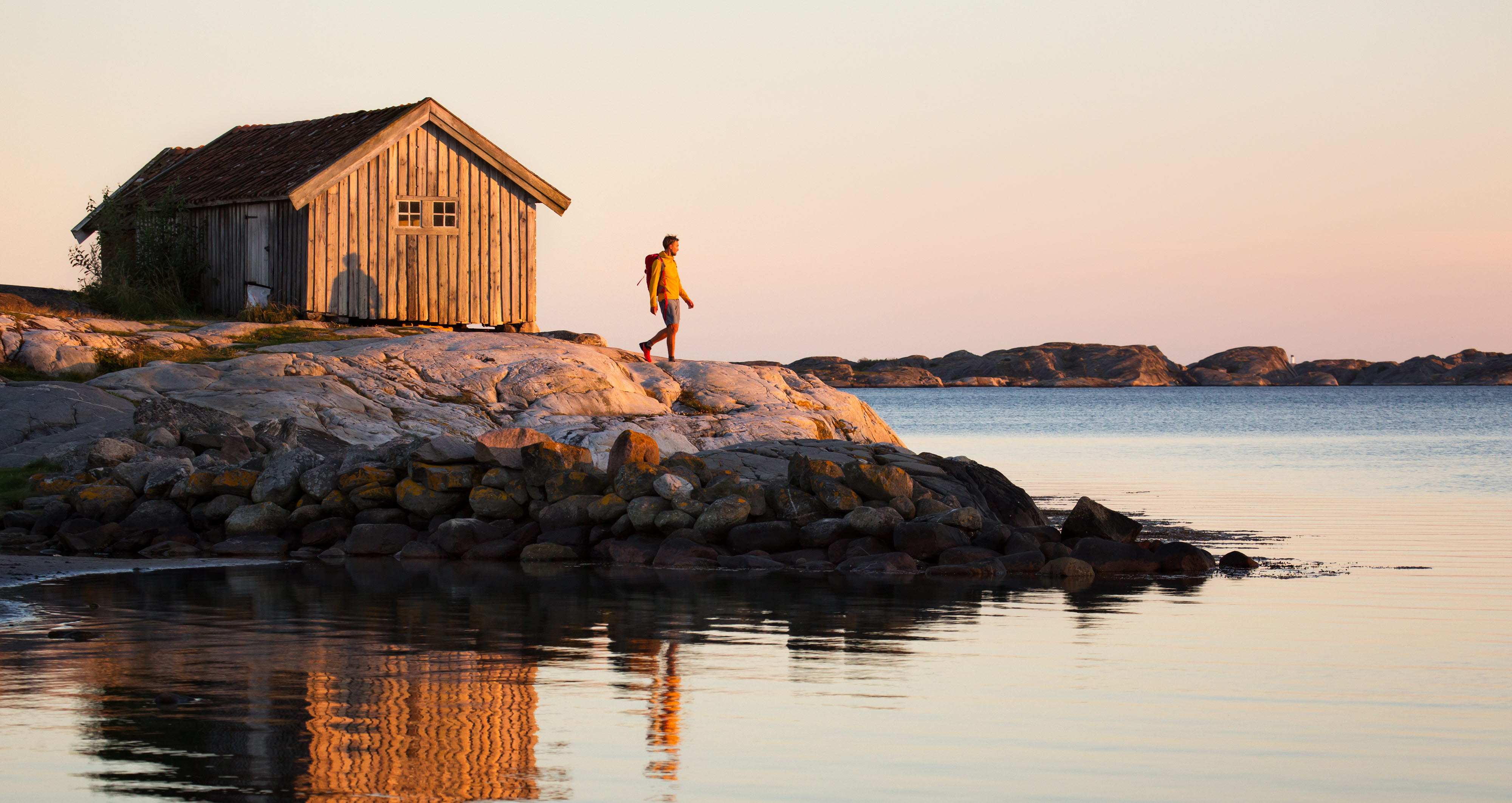 Walking by the ocean at sunset