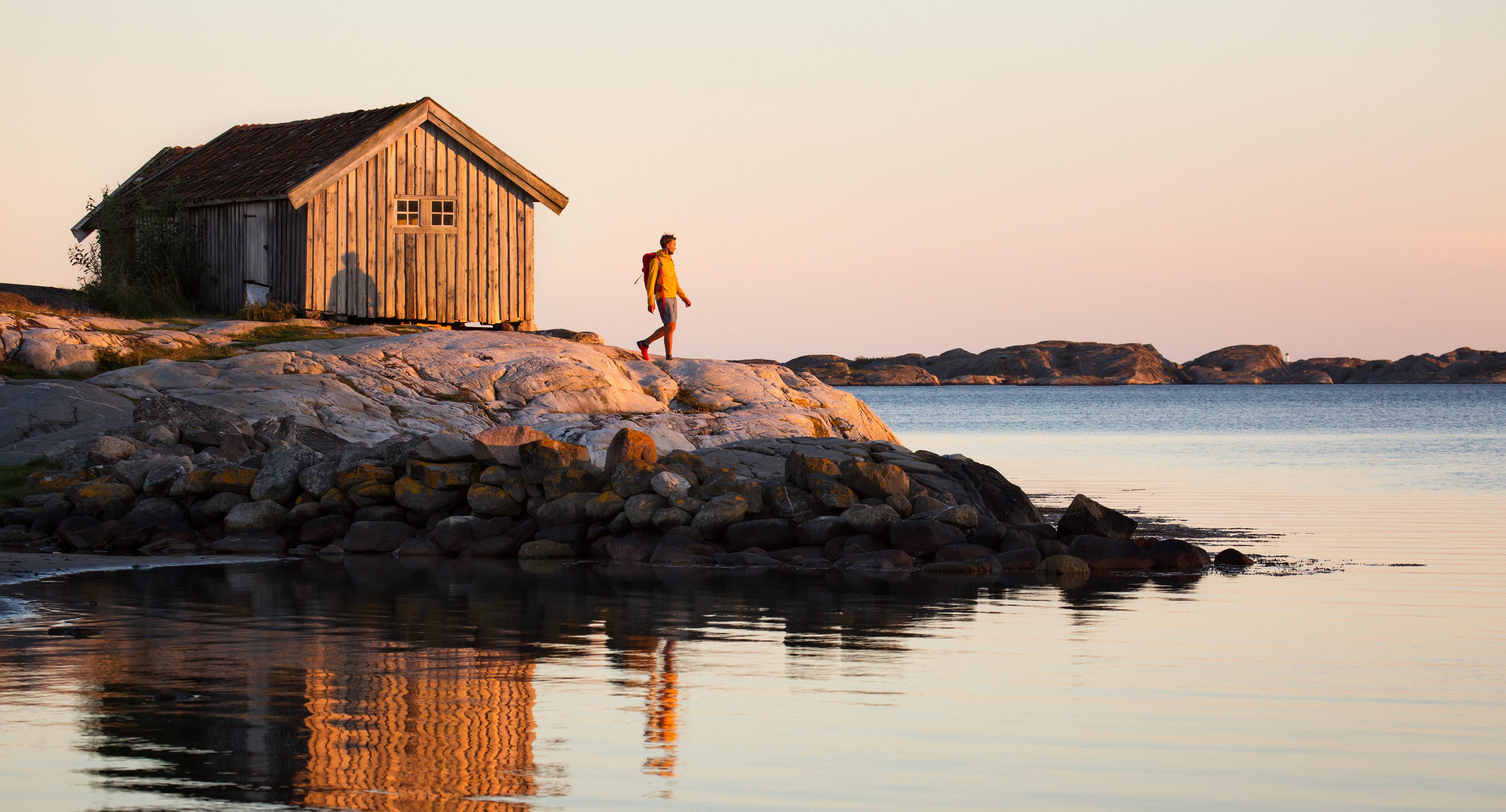 Walking by the ocean at sunset