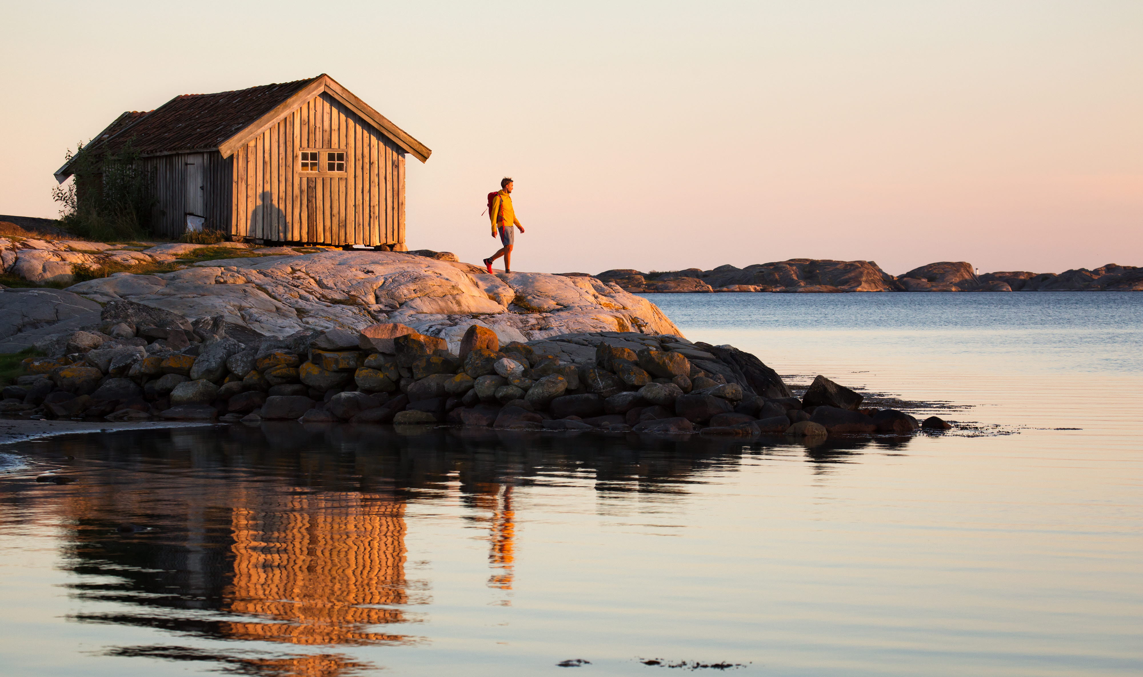 Walking by the ocean at sunset