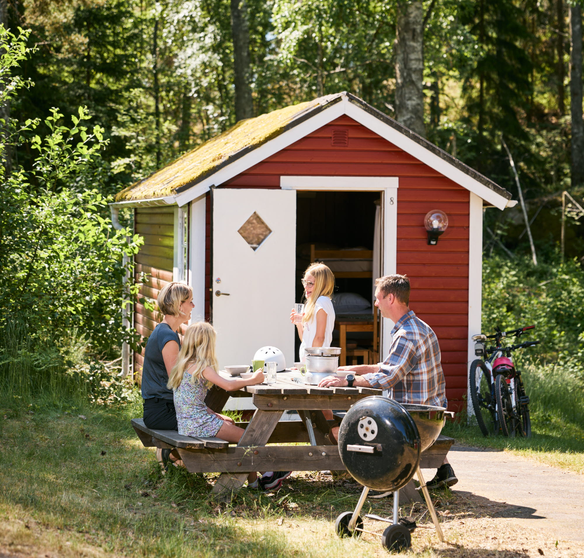 Family at a camping cabin.