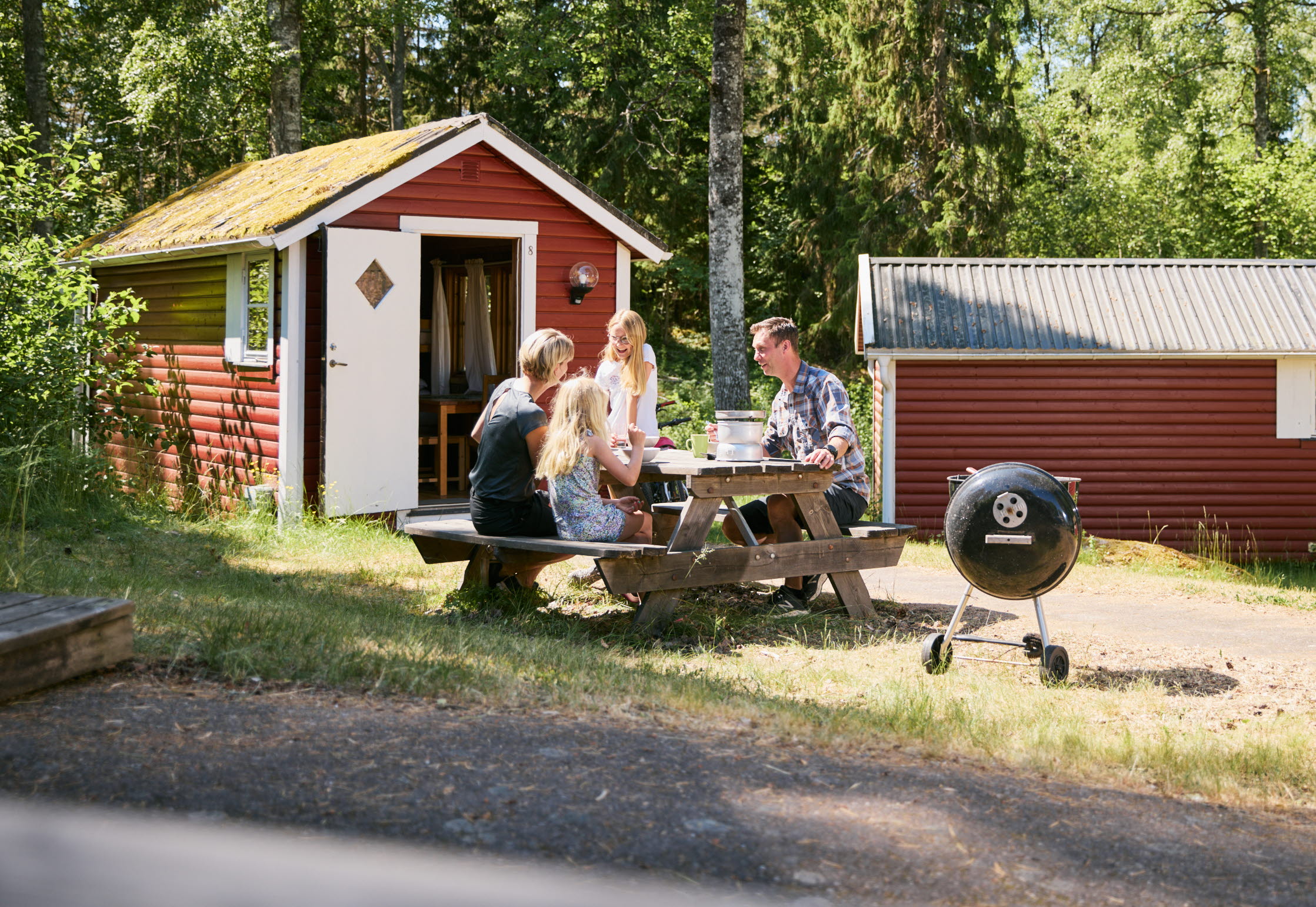 Family at a camping cabin.