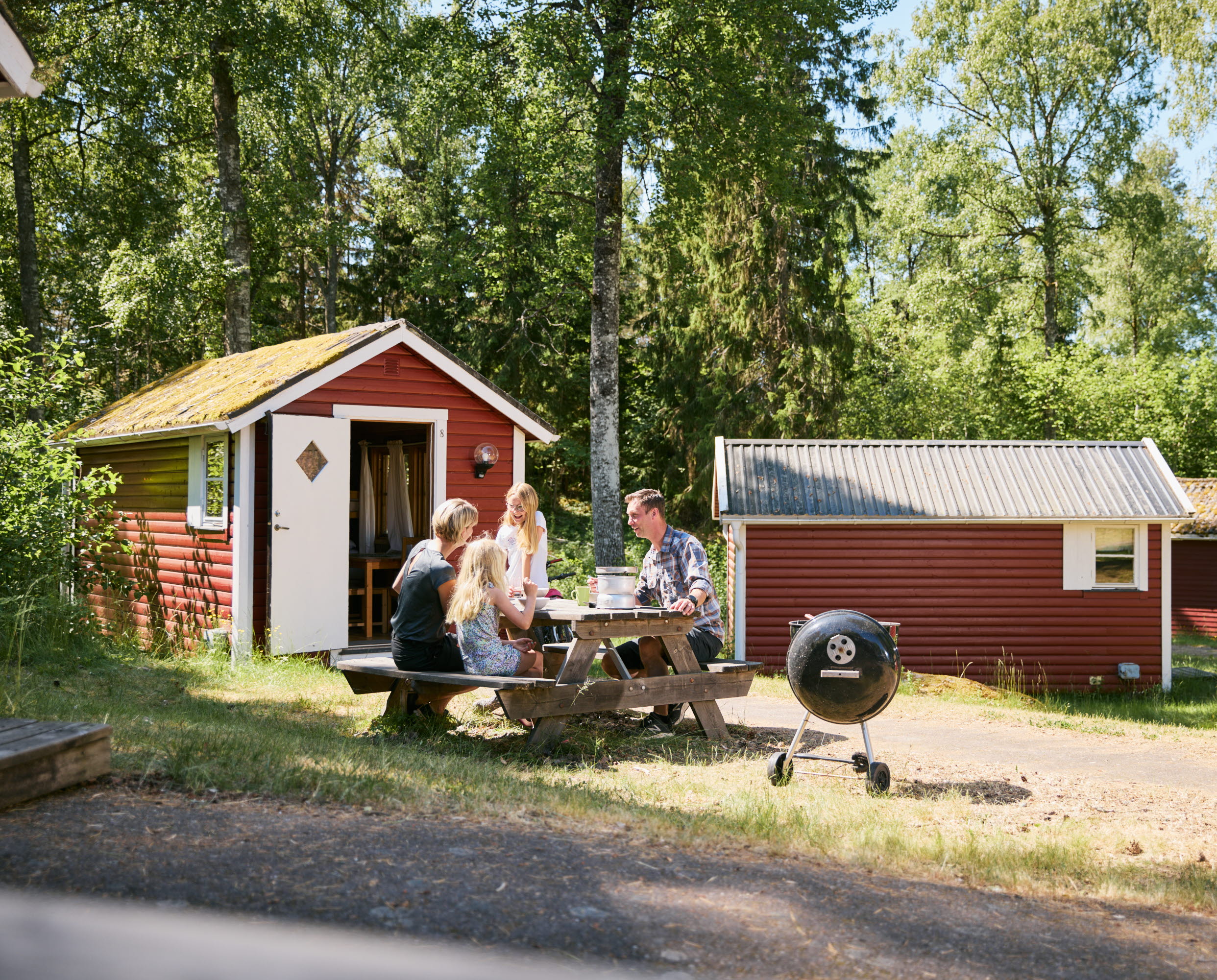 Family at a camping cabin.