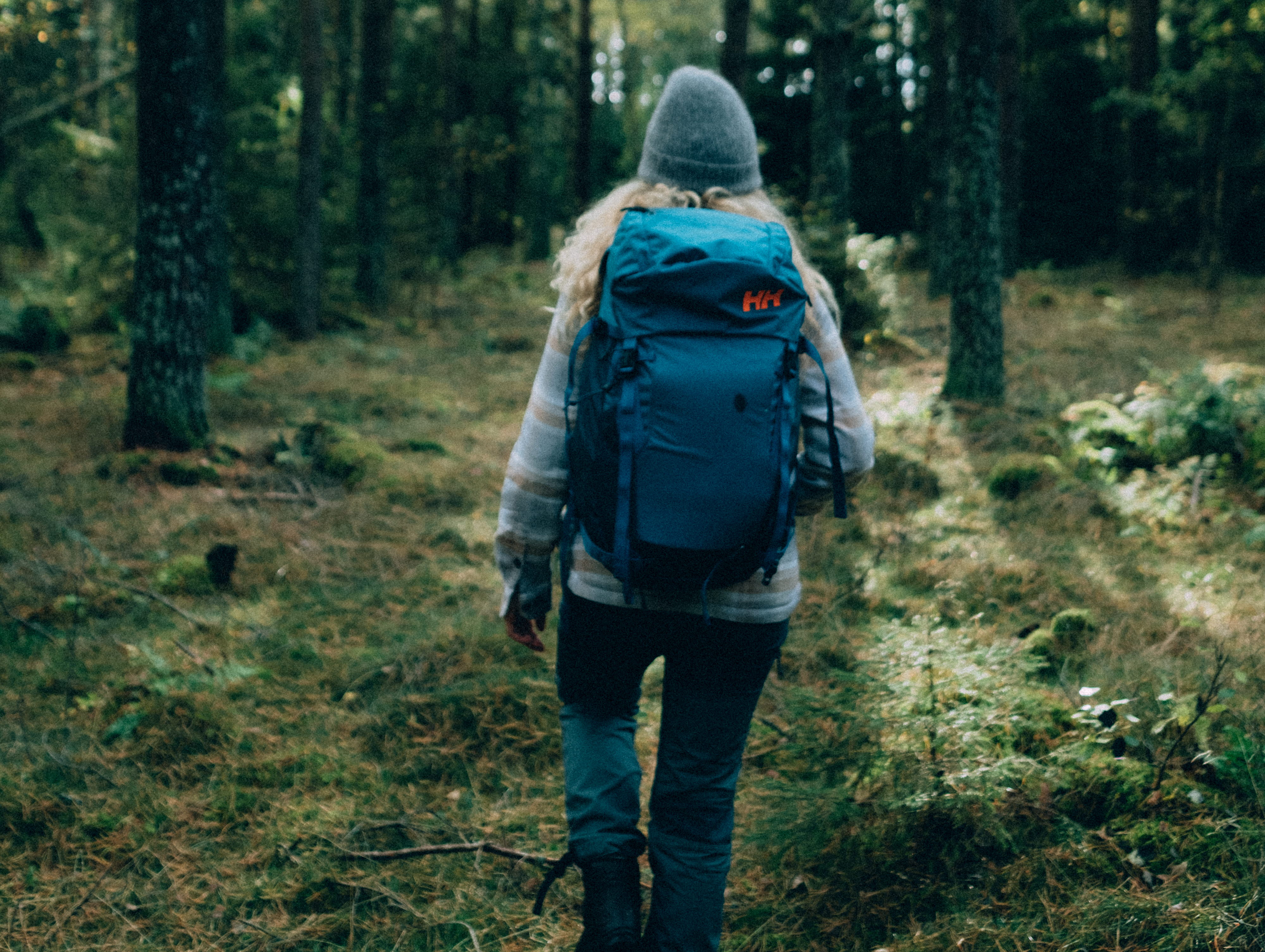 Woman hikes the Pilgrim Path