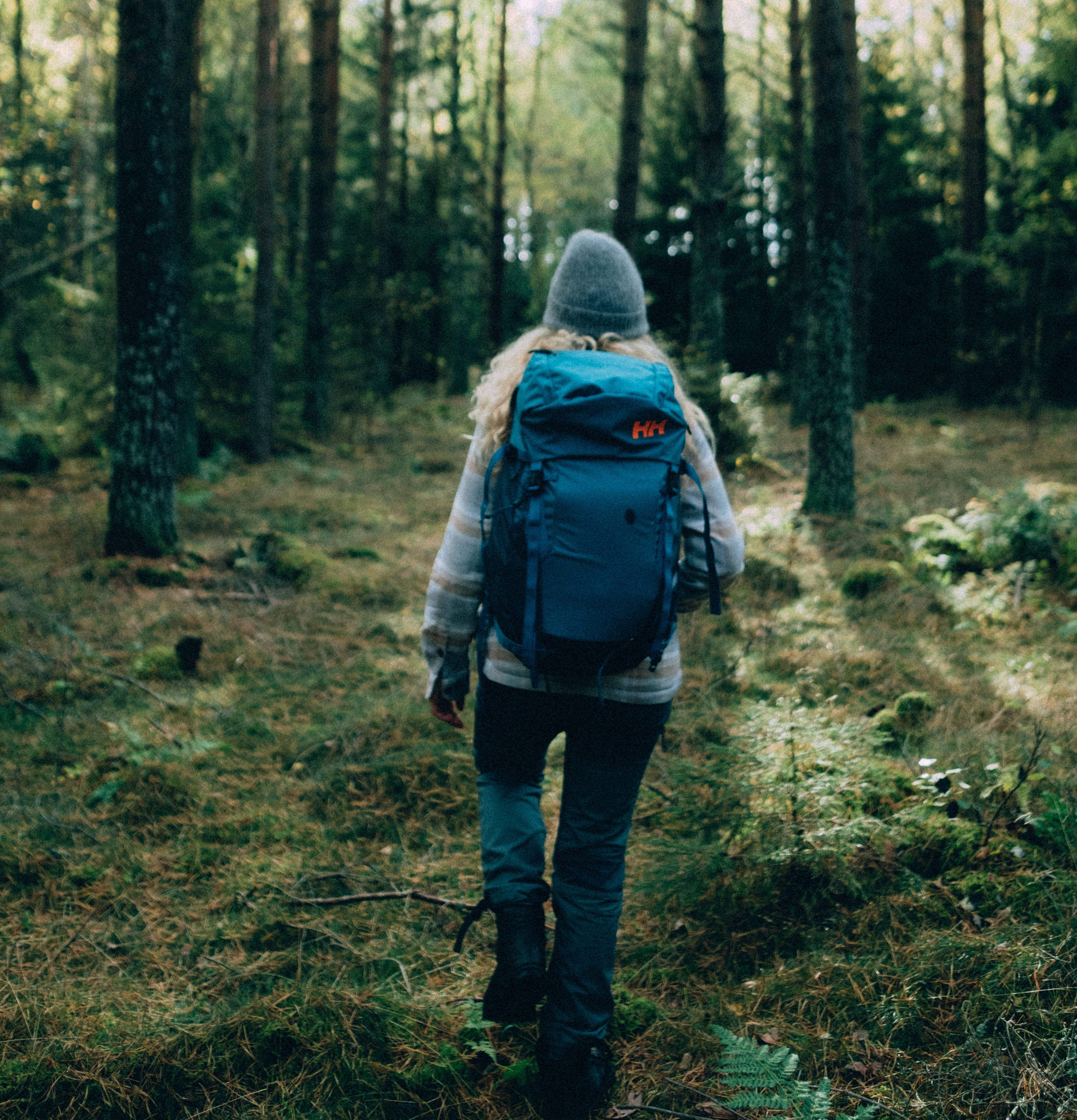 Woman hikes the Pilgrim Path