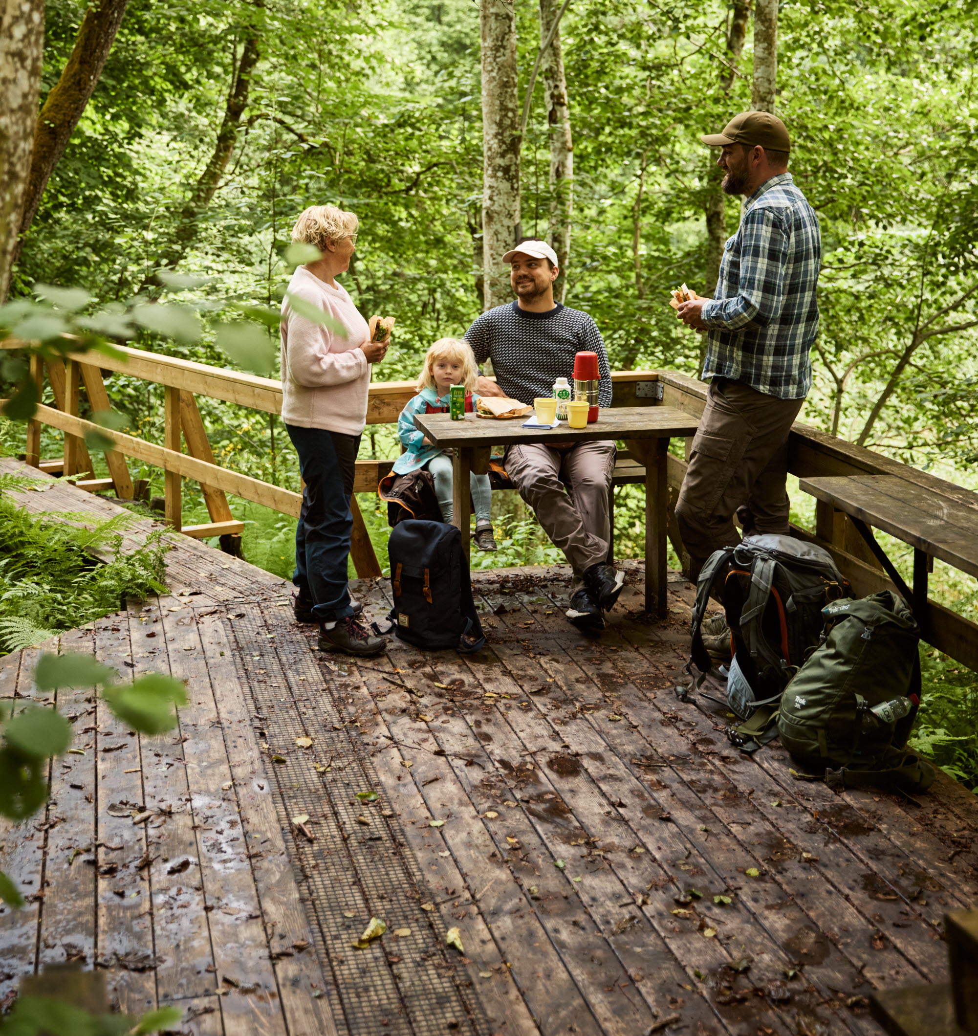 People walking in lush nature.