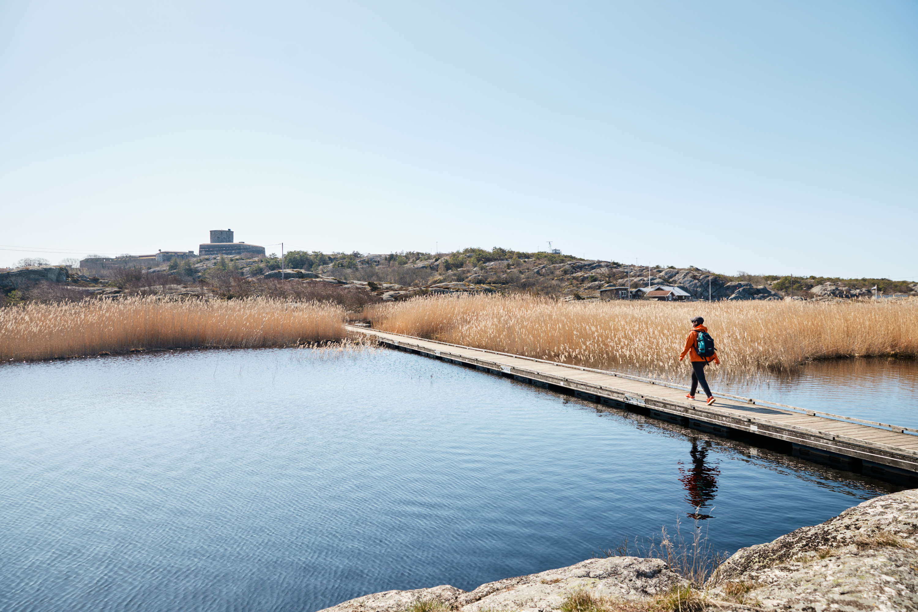 woman walks over a span.