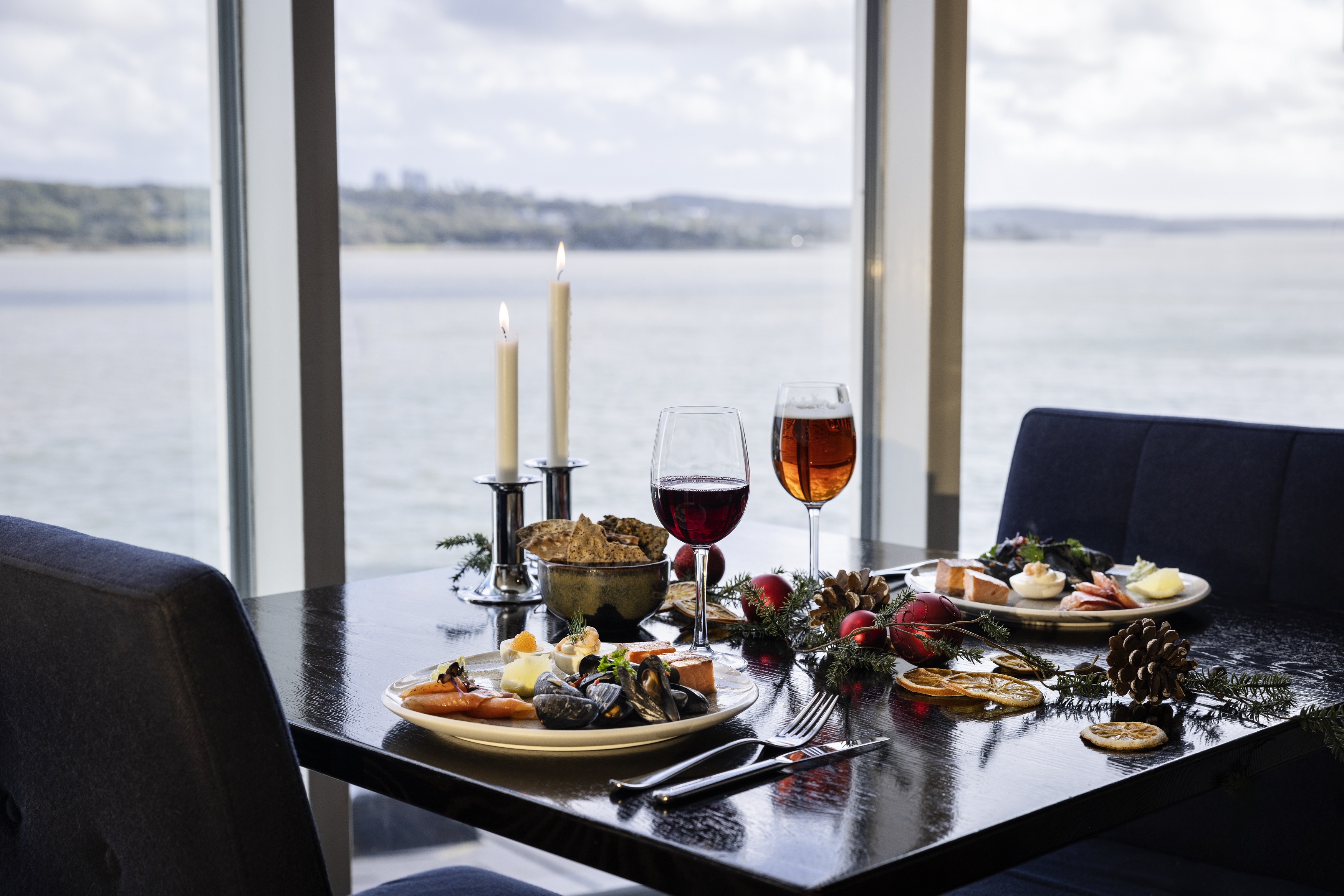 Set table with Christmas food.