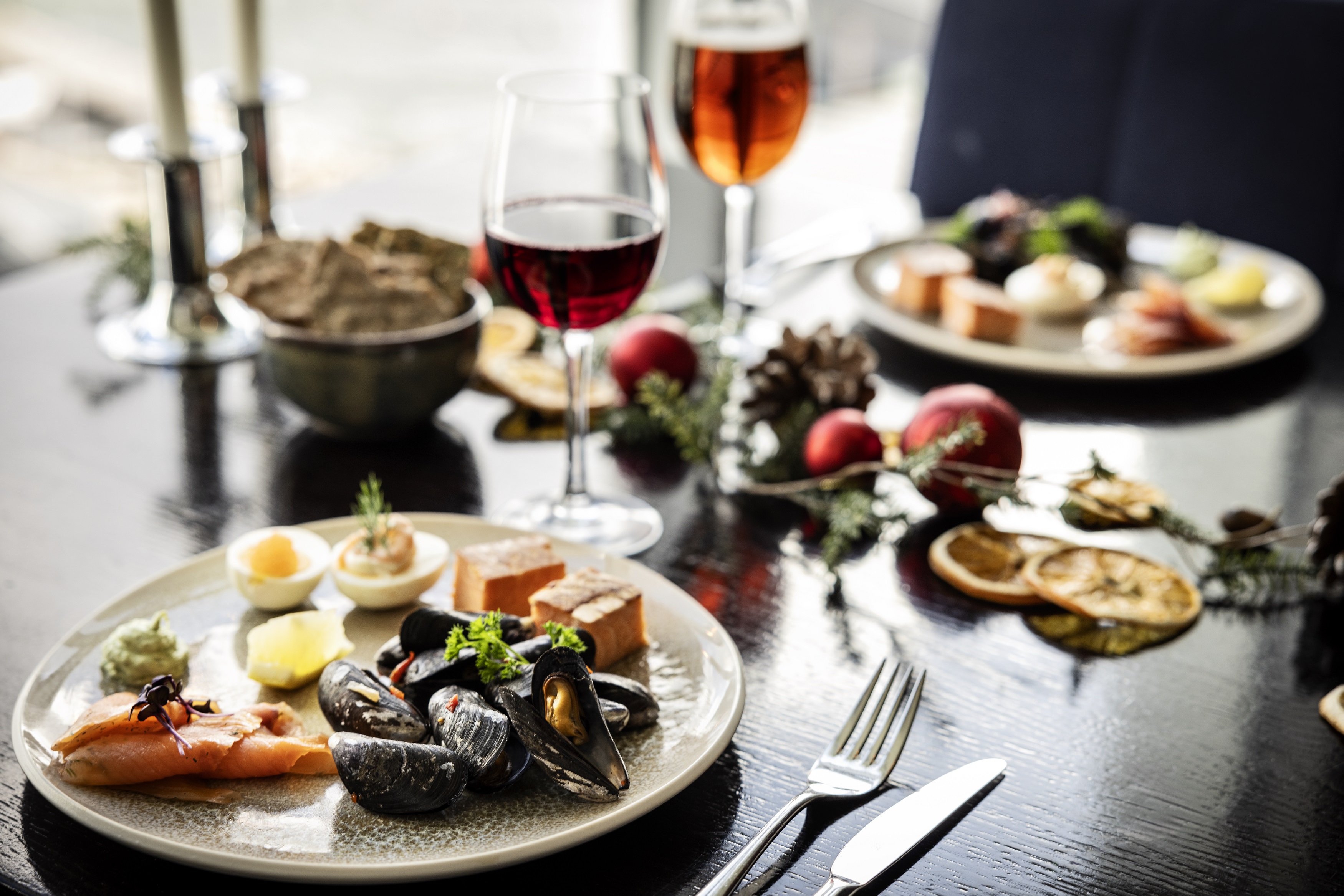 Set table with Christmas food.