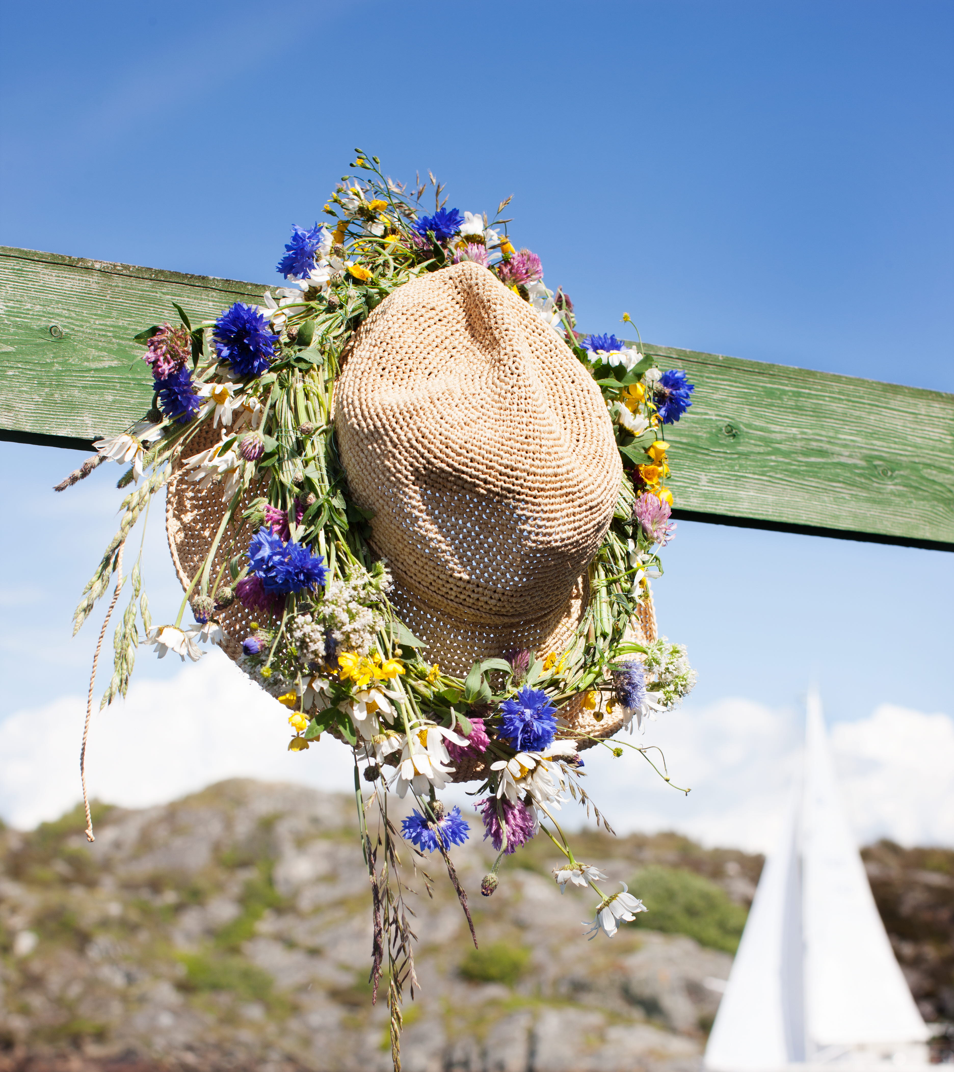 Midsommarkrans på hatt