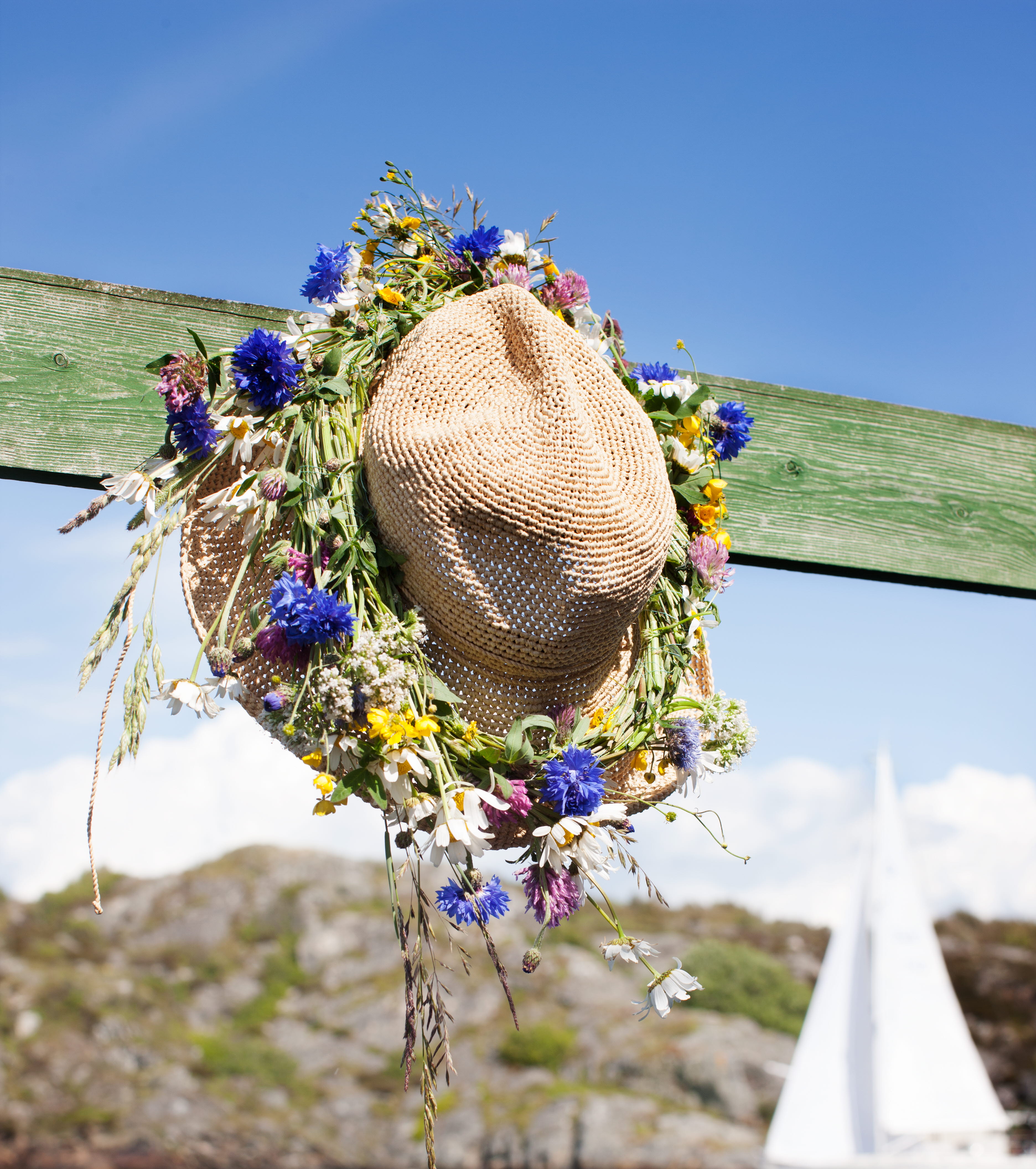 Midsommarkrans på hatt