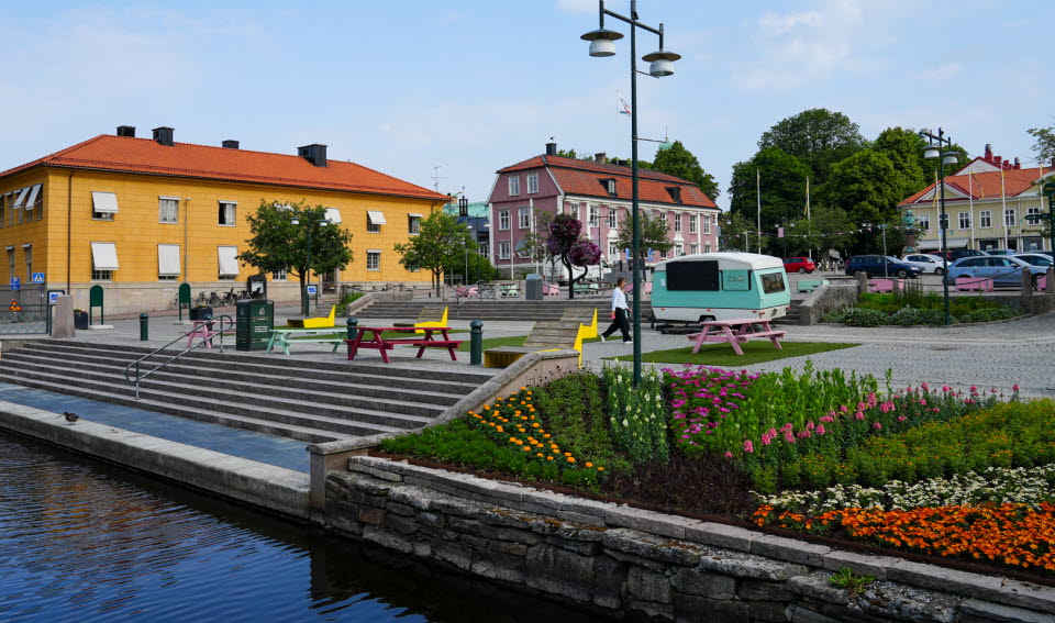 Marketplace with flowers and water with houses in the background a nice summerday. 