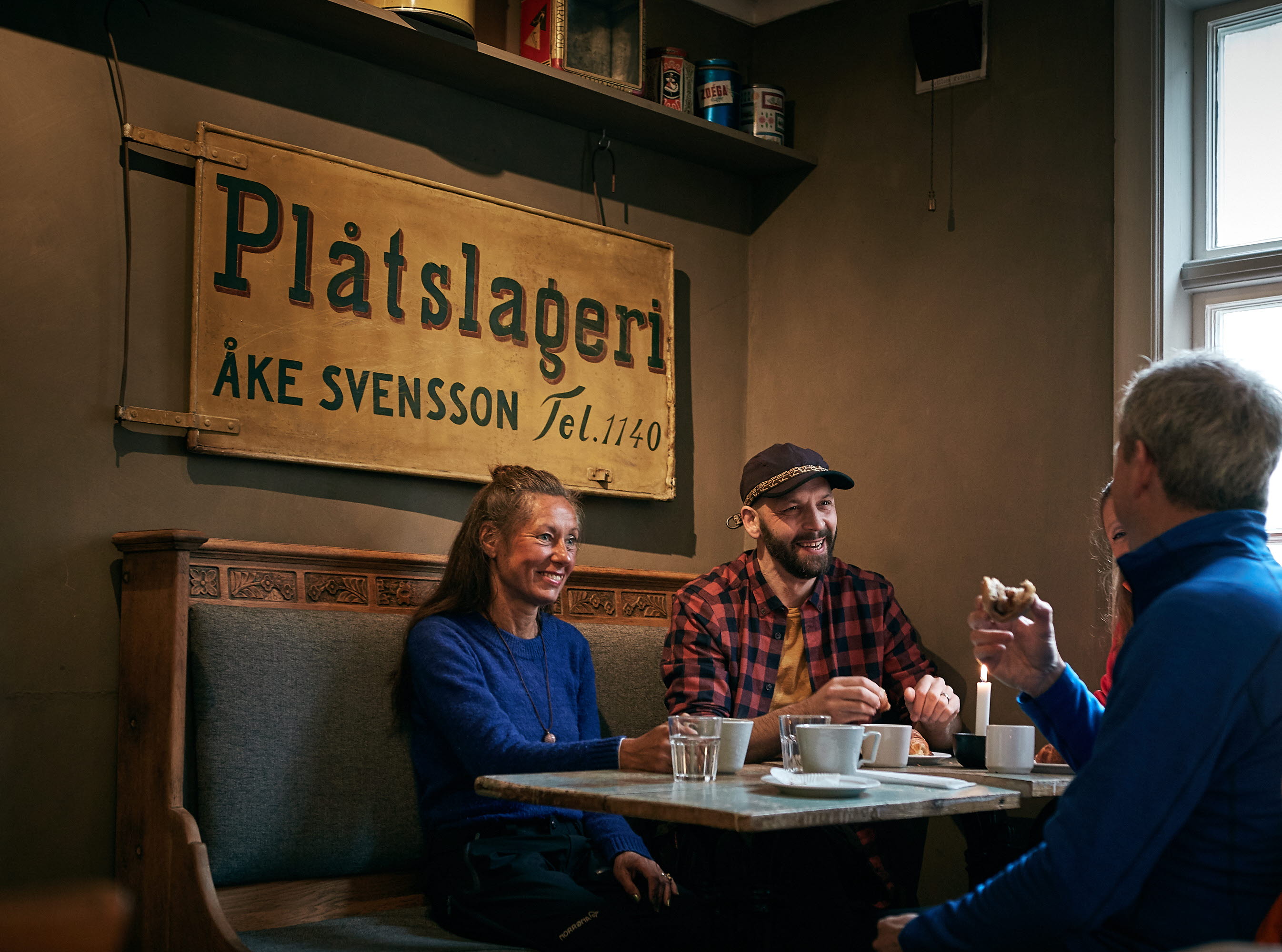 women and men having a coffee.
