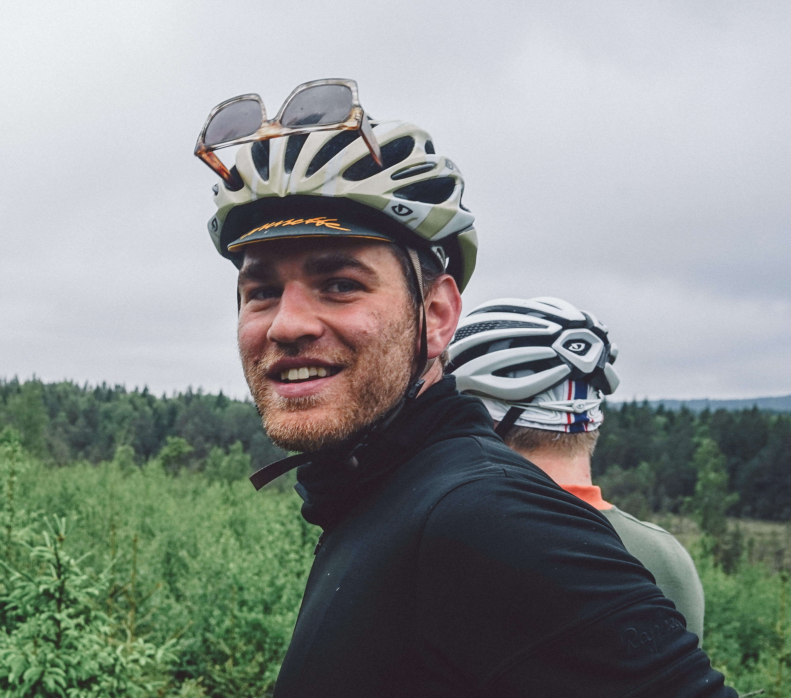 Cyclists in a green and beautiful nature.