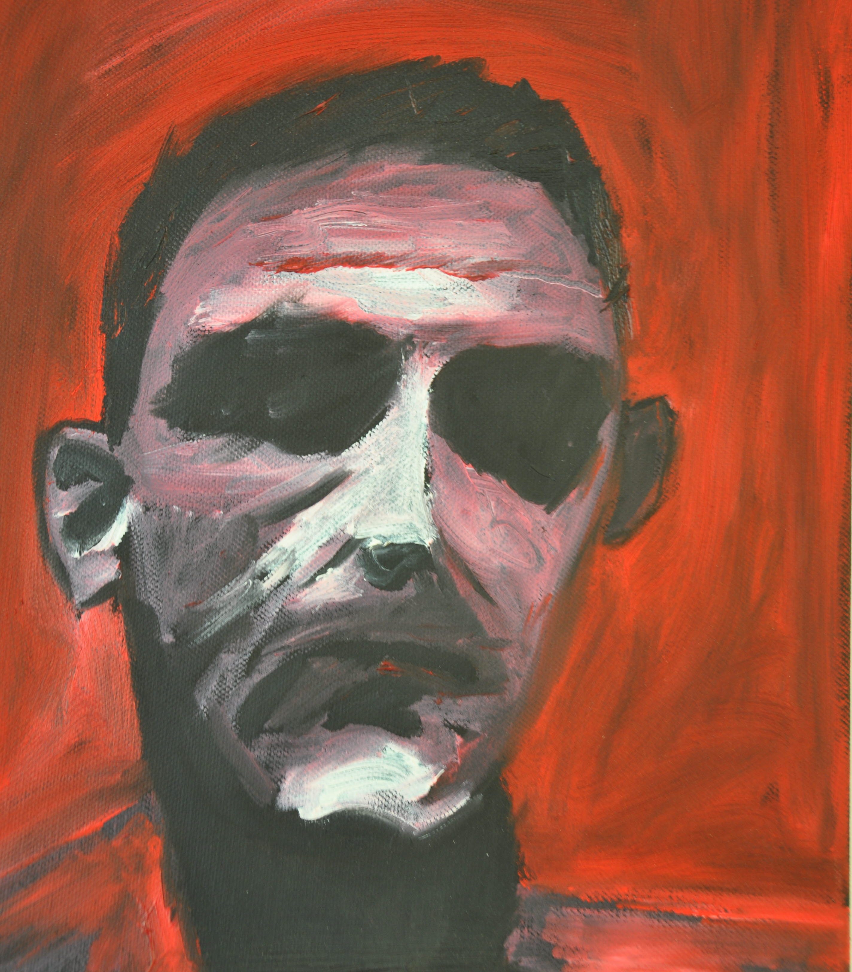 Ett ansikte med röd bakgrund.